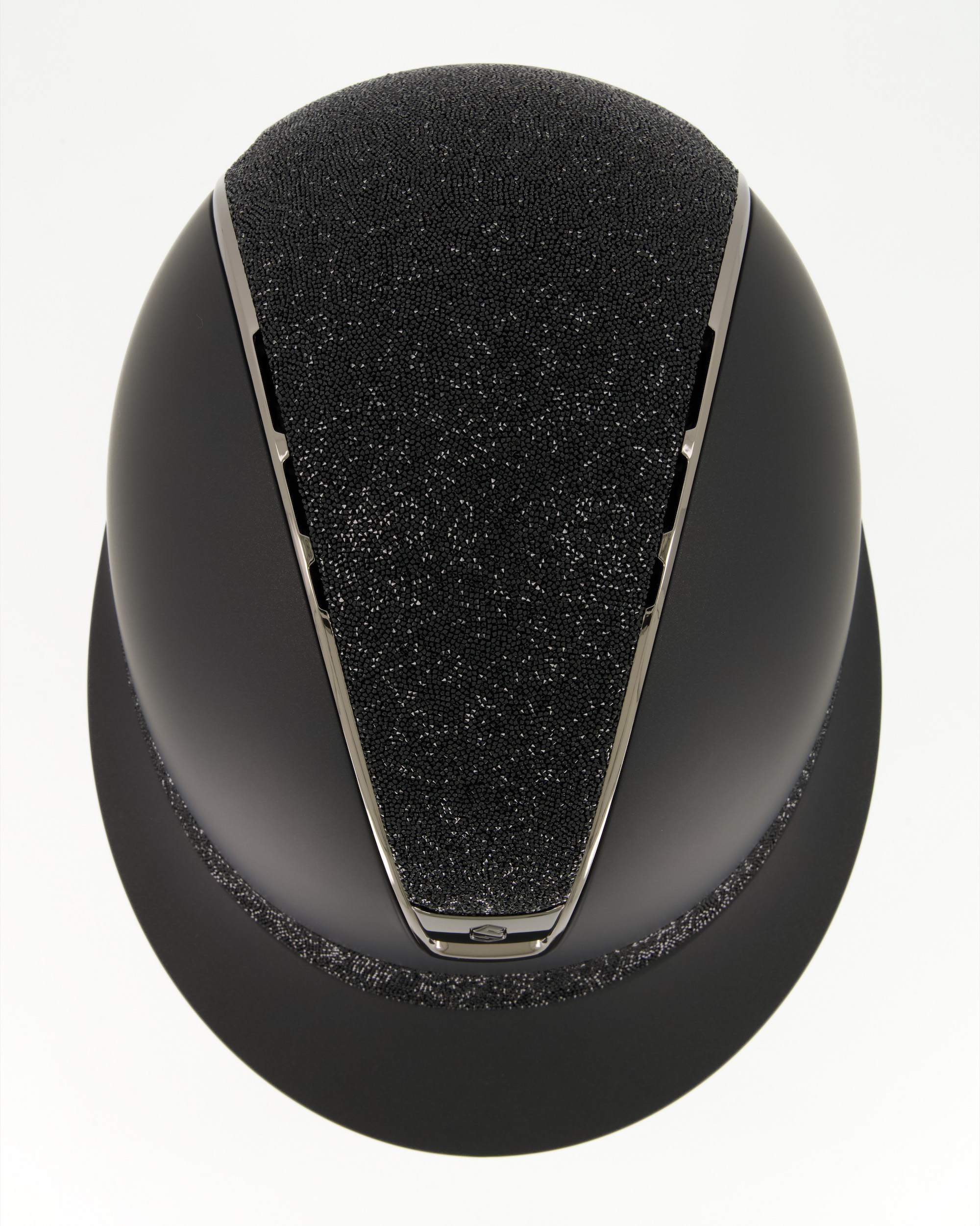 Riding helmet 2.0 Miss Shield Shadowmatt Black, Top and front strap Ultra Fine Rock, Trim and Blason Chrome Black in black