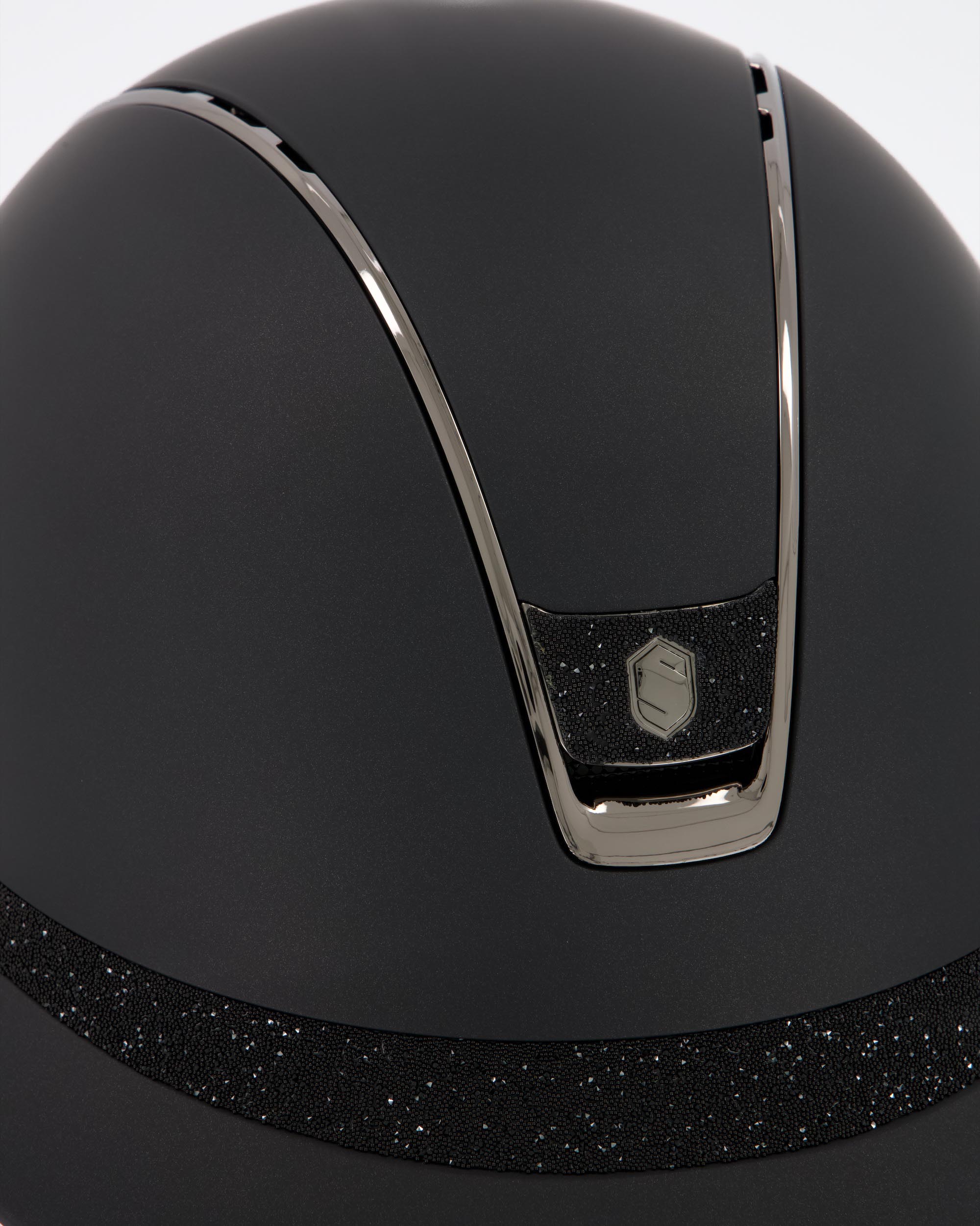 Riding helmet 2.0 Miss Shield Shadowmatt Black, Frontal Band Crystal Fabric, Trim Black Chrome, Blason Crystal Fabric Black in black