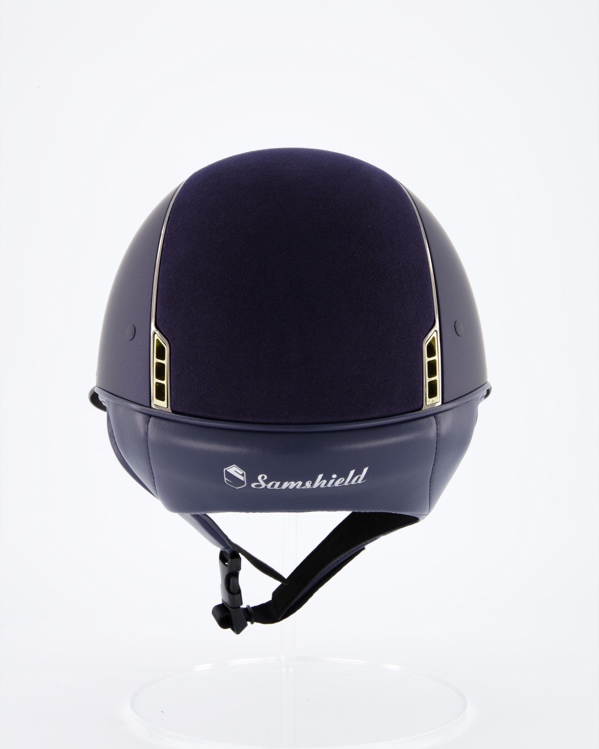 Riding helmet Miss Shield Shadowmatt Blue, Top Alcantara Blue, Frontal Band Crystal Fabric Swarovski Metal Eclipse, Trim Chrome Black, Blason Crystal Fabric Gold