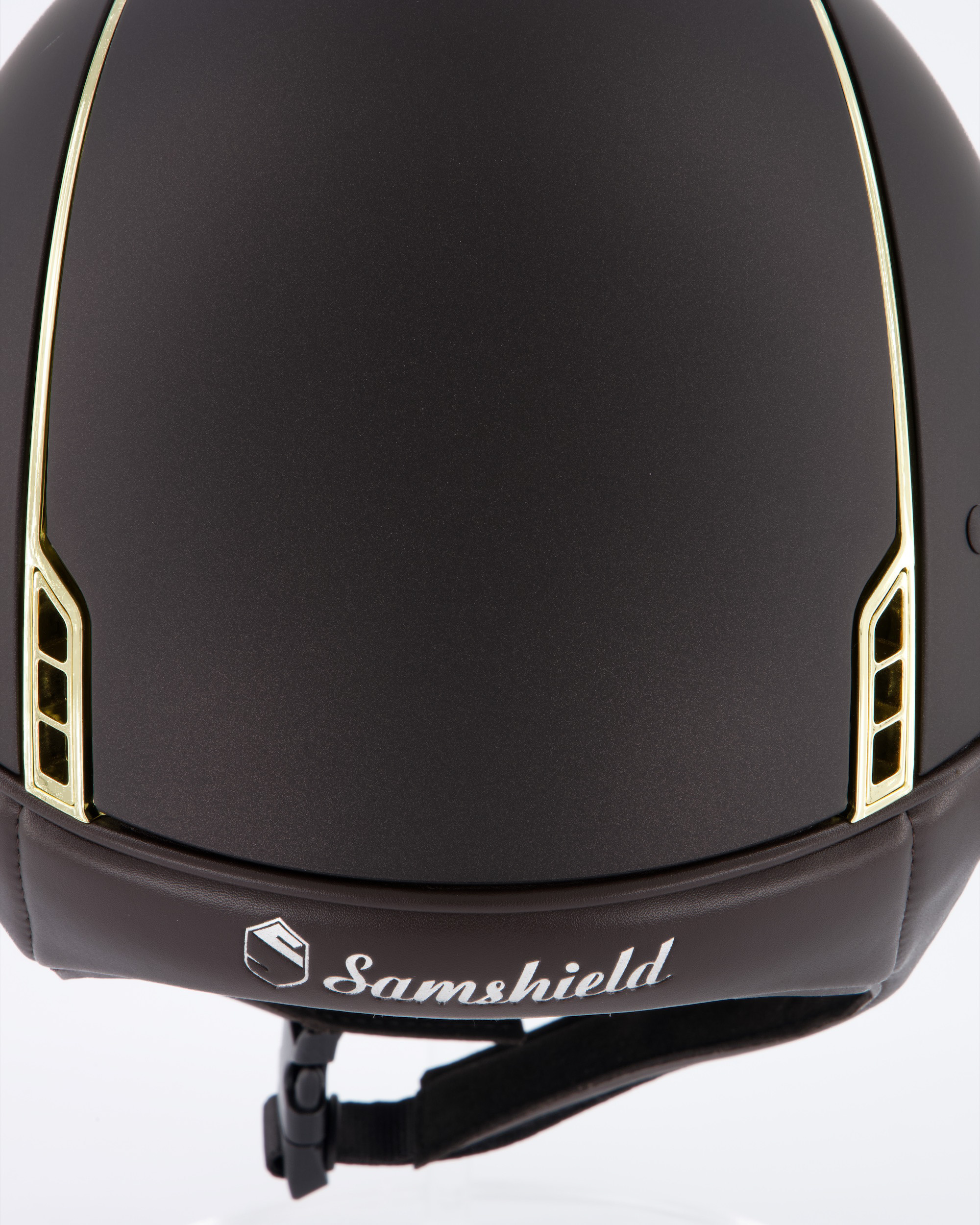Reithelm Miss Shield Shadowmatt Braun, Top Shadowmatt Braun, Frontal Band Shimmer Braun, Trim Chrome Gold, 5 Swarovski Blason Chrome Gold
