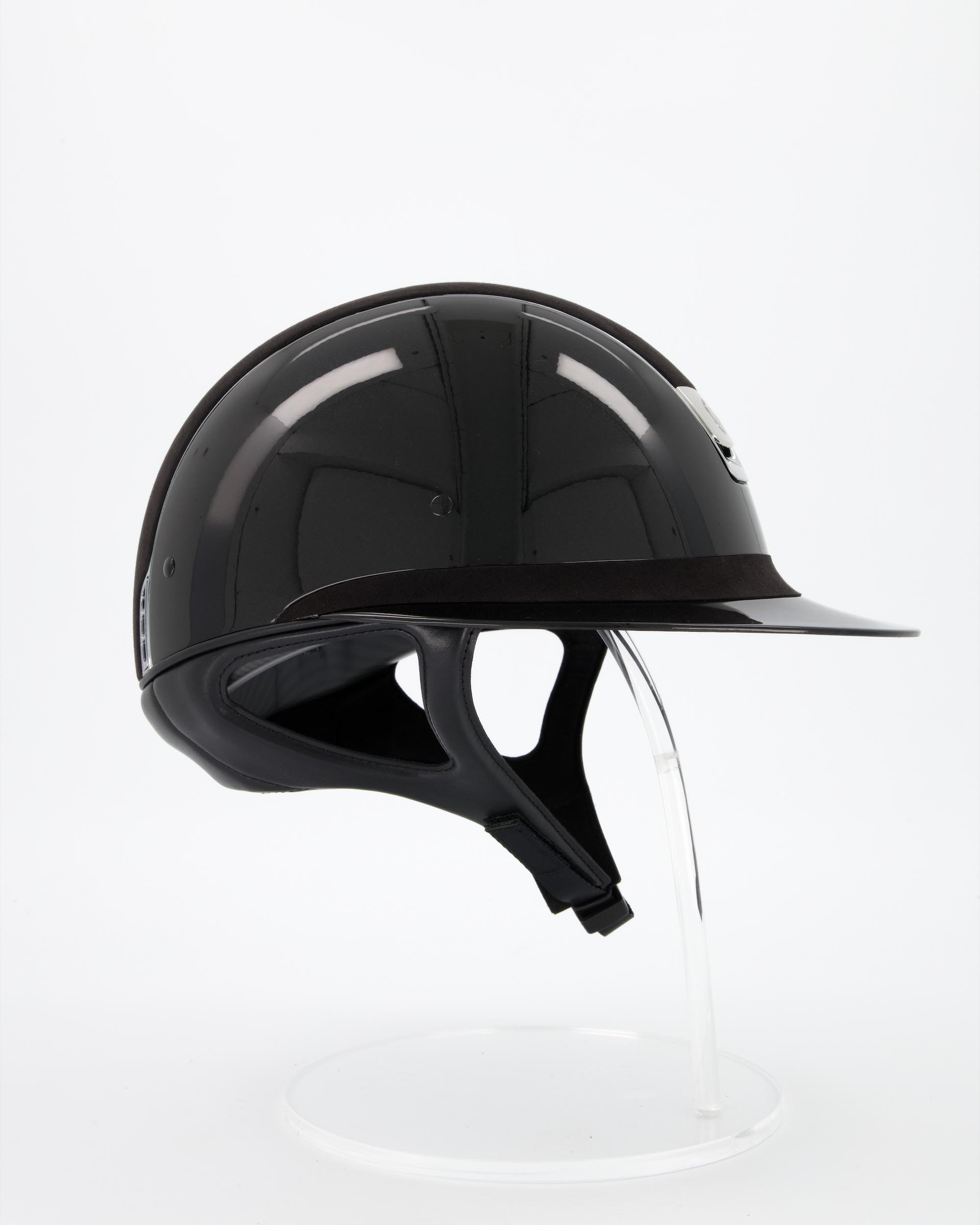 Riding helmet Miss Shield Shadowglossy Black, Top Alcantara Black, Frontalband Alcantara Black, Trim Chrome Silver, Blason Chrome Silver in black