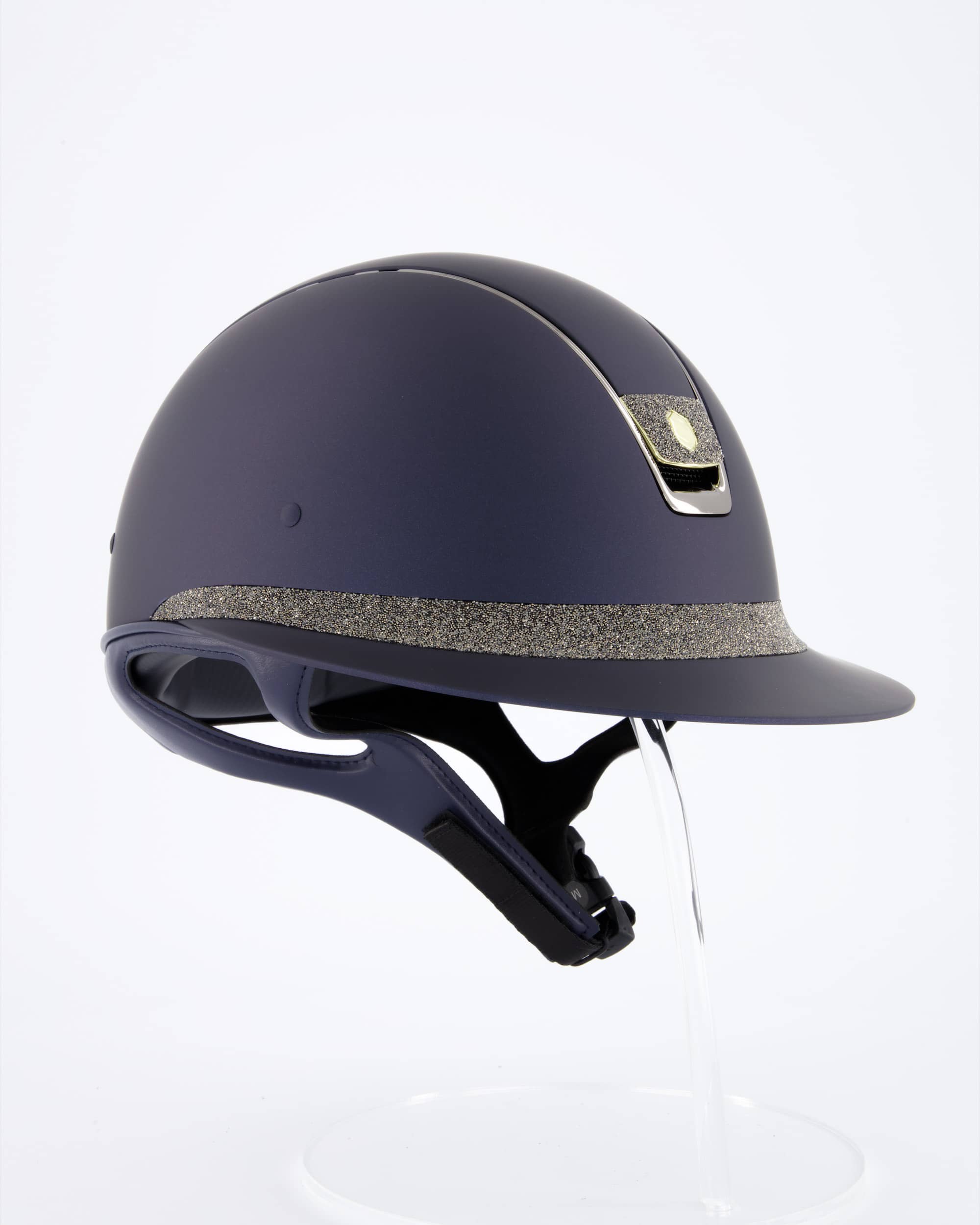 Riding helmet Miss Shield Shadowmatt Blue, Top Shadowmatt blue, Frontal Band Crystal fabric Swarovski Metal Eclipse, Trim Chrome Black, Blason Crystal Fabric Gold