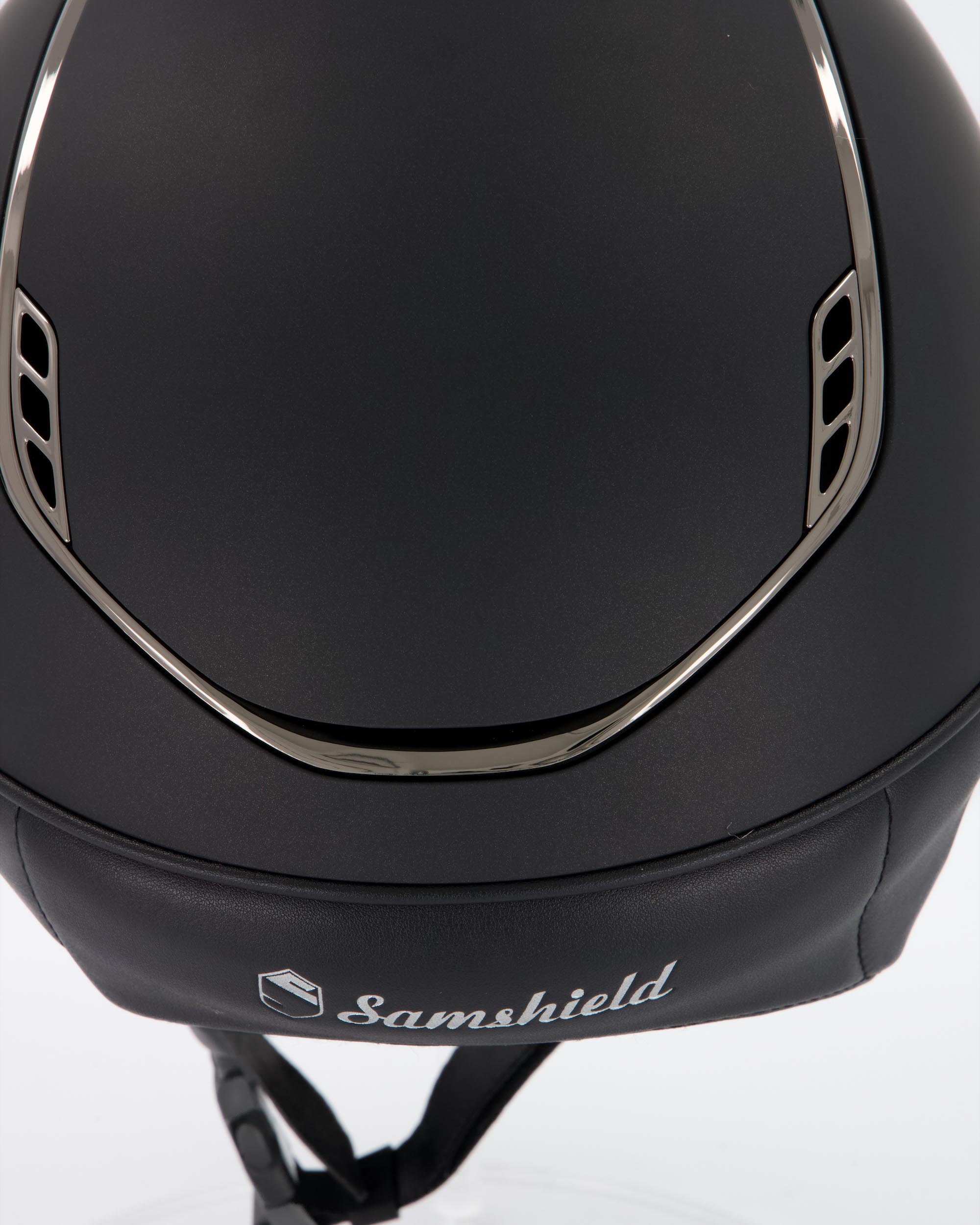 Riding helmet 2.0 Miss Shield Shadowmatt Black, Frontal Band Crystal Fabric, Trim Black Chrome, Blason Crystal Fabric Black in black