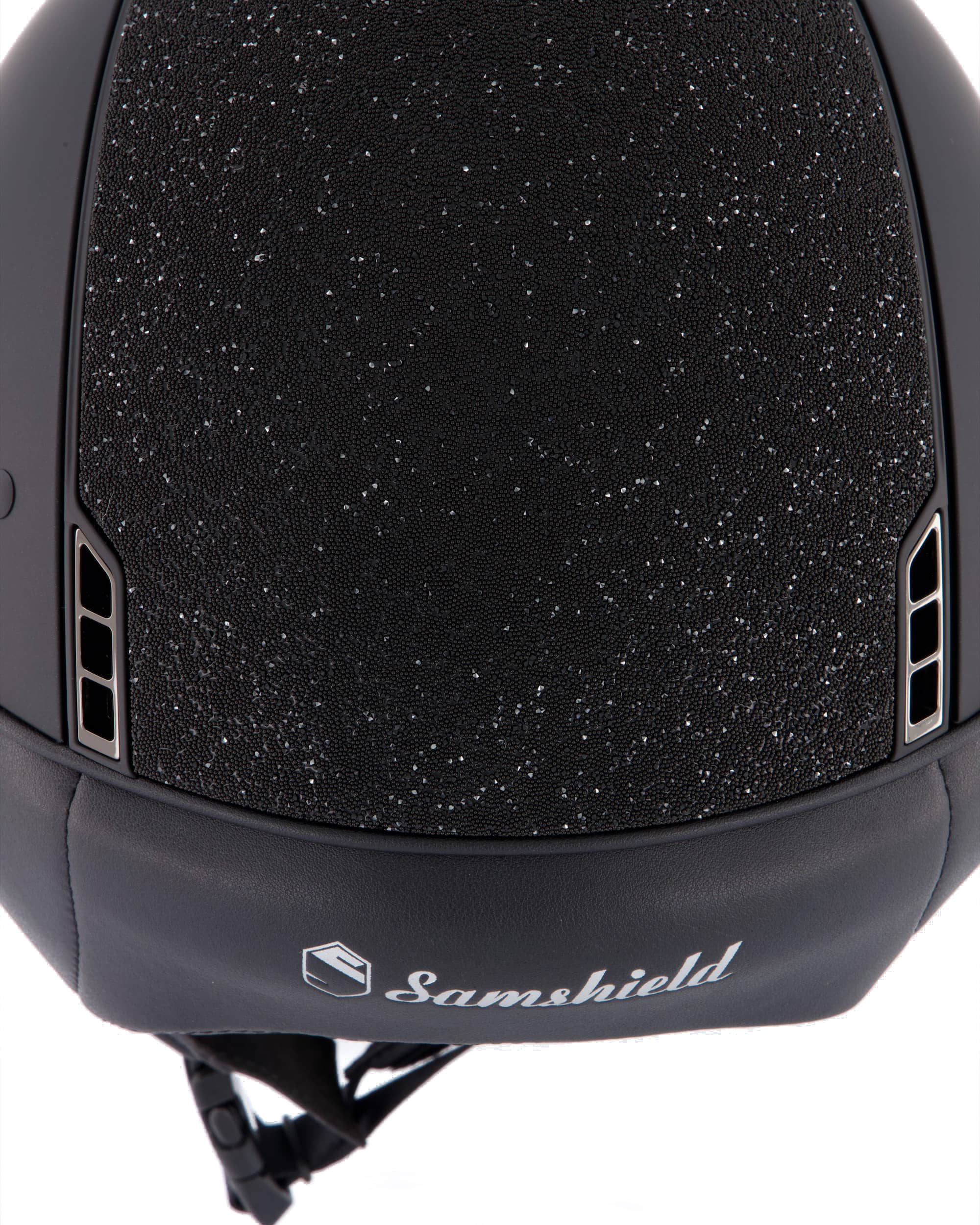 Riding helmet Miss Shield Shadowmatt, Top Crystal Fabric Swarovski Black, Frontal Band Crystal Fabric Swarovski Black, Trim Matt Black, Blason Chrome Black in black