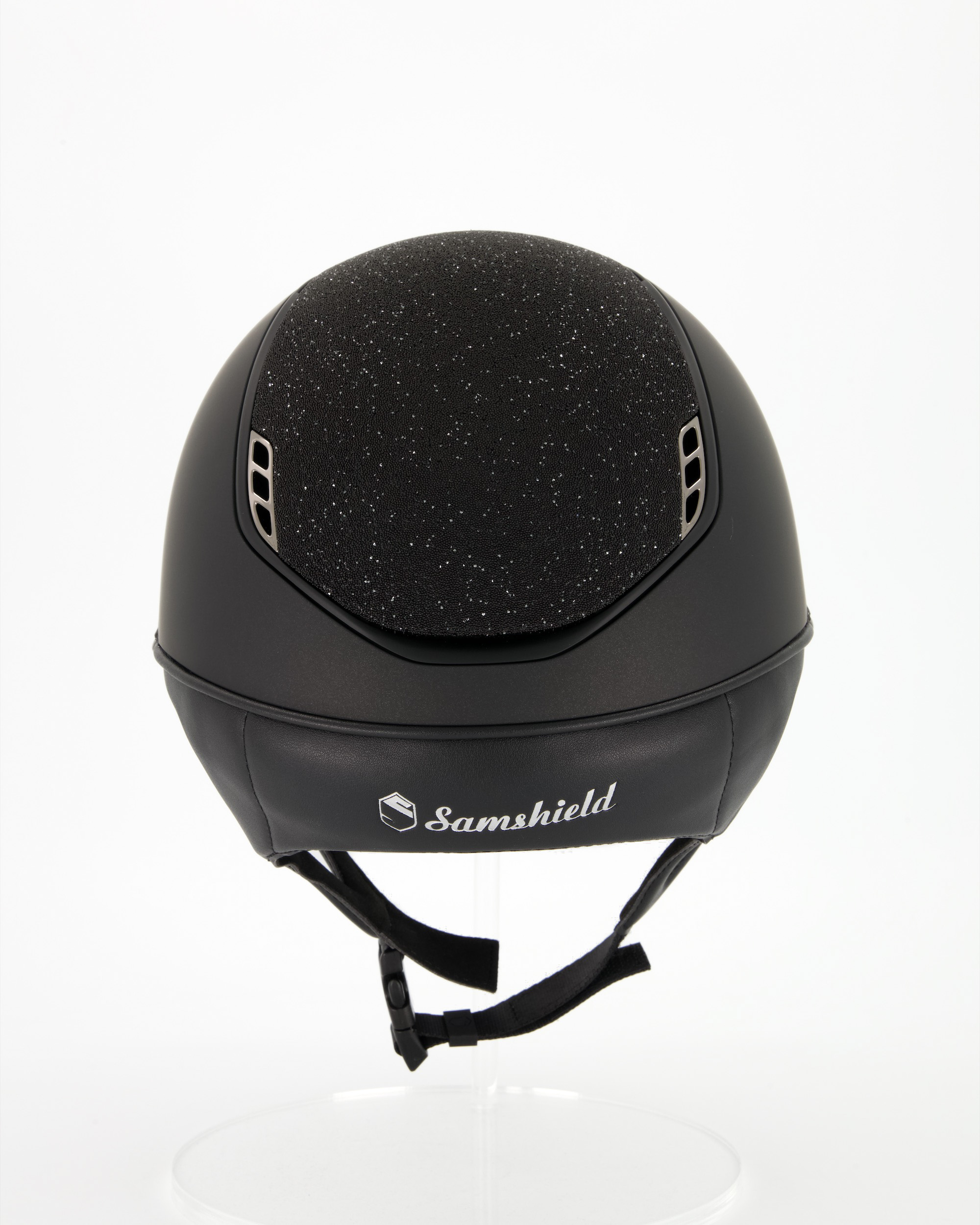 Riding helmet 2.0 Miss Shield Shadowmatt, Top Crystal Fabric Swarovski Black, Frontal Band Crystal Fabric Swarovski Black, Trim Matt Black, Blason Chrome Black in black