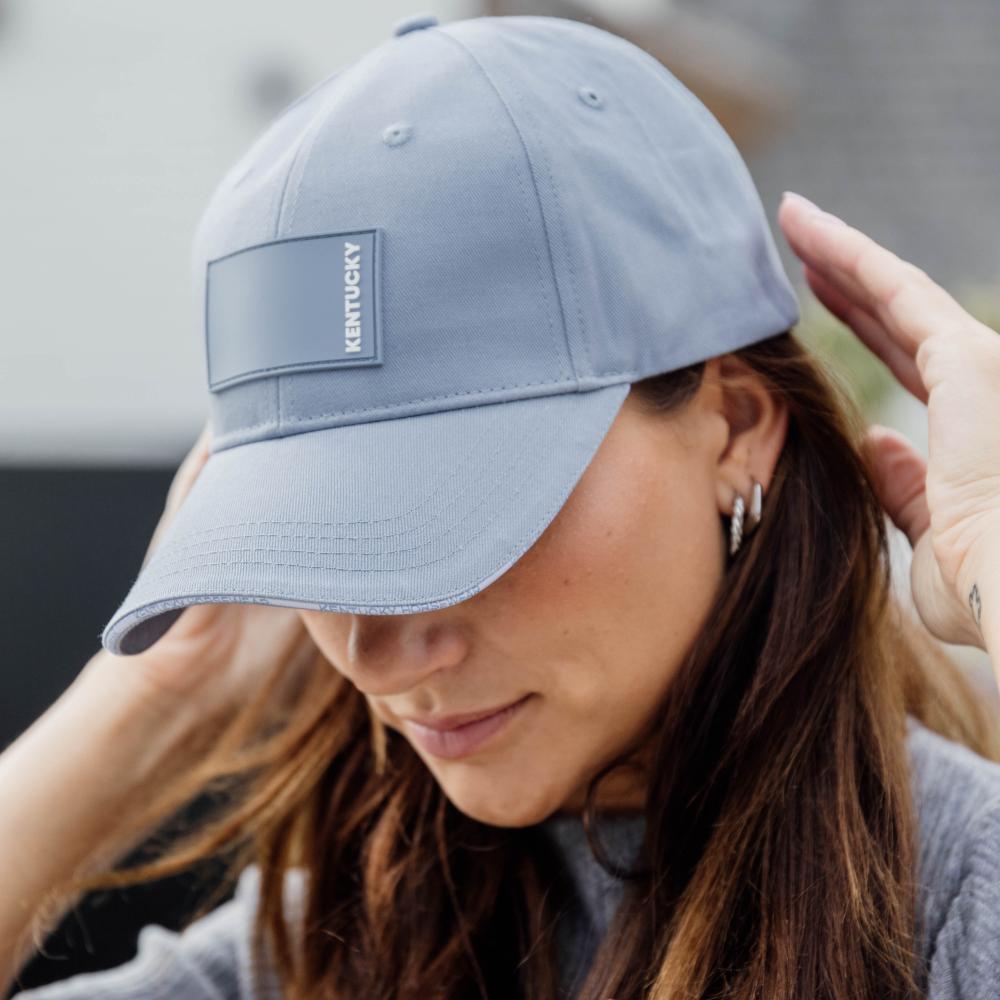 Cap with rubberised logo
