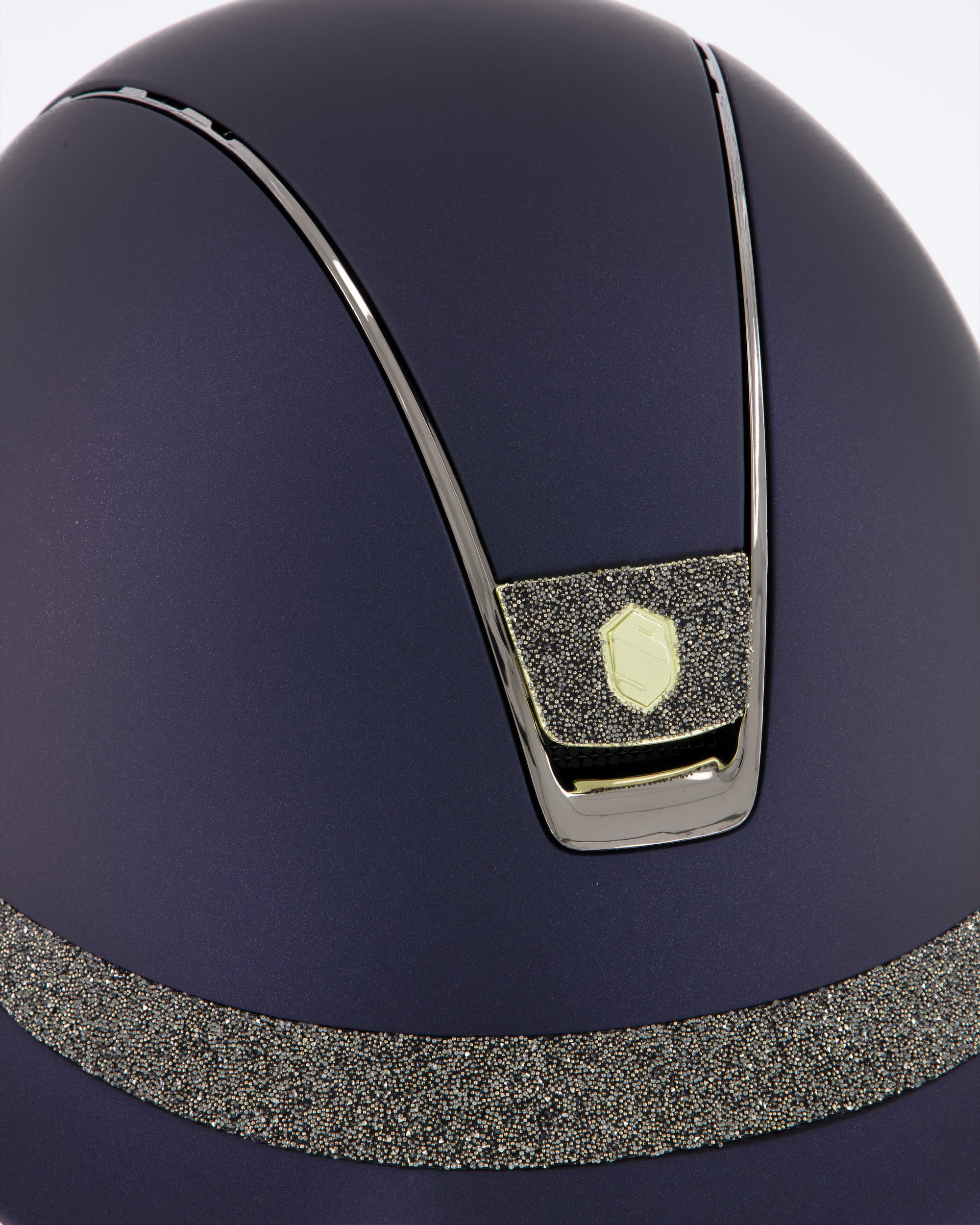 Riding helmet Miss Shield Shadowmatt Blue, Top Shadowmatt blue, Frontal Band Crystal fabric Swarovski Metal Eclipse, Trim Chrome Black, Blason Crystal Fabric Gold