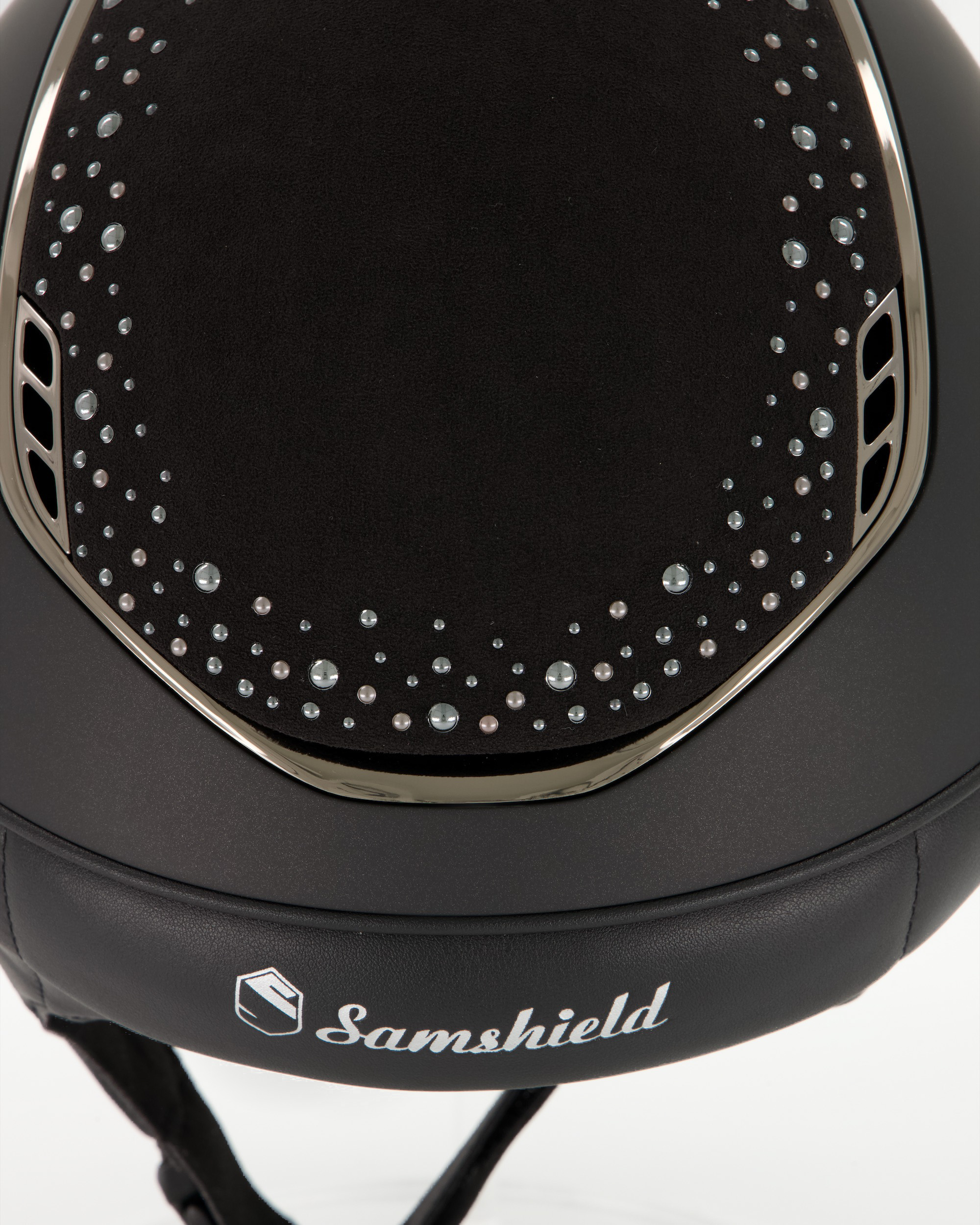 Riding helmet 2.0 Miss Shield Shadowmatt Black, Top and front strap night pearl, Trim and Blason Chrome Black in black