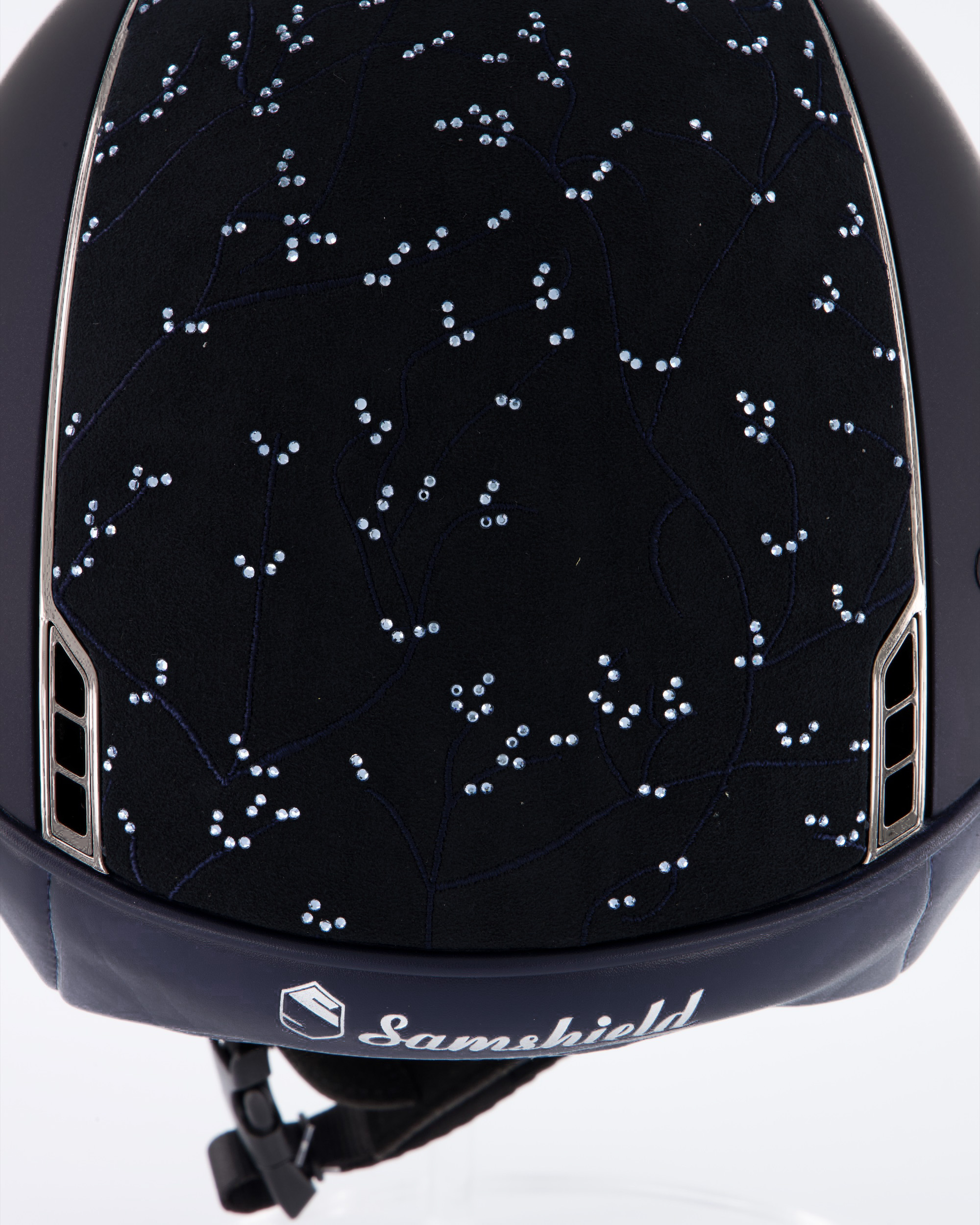 Riding helmet Miss Shield Shadowmatt Blue, Top Crystal Leaf Blue / Alcantara Blue, Frontal Band Alcantara Blue, Trim Chrome Black, Blason Chrome Black in blue