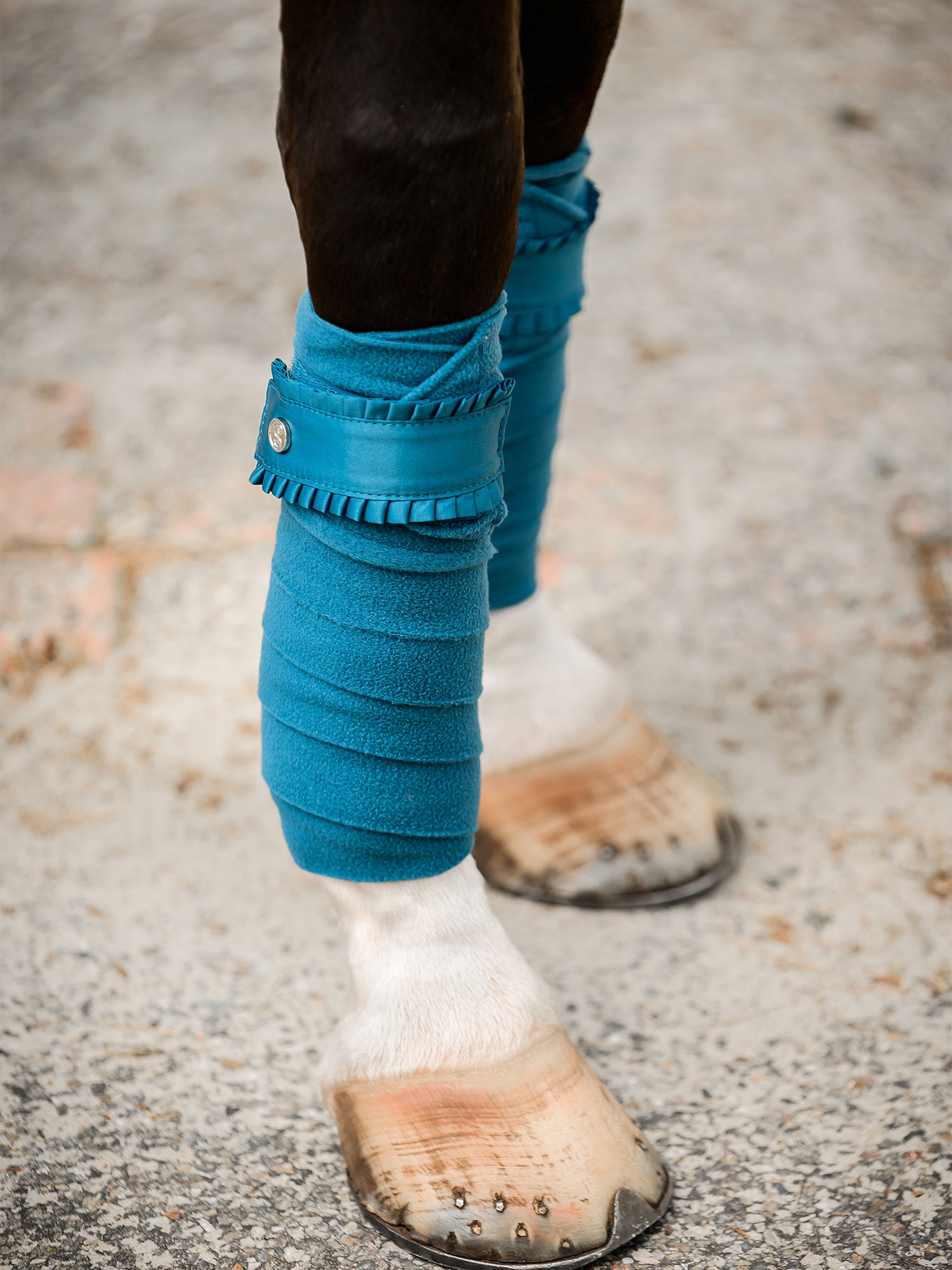 Ruffle bandages in petrol blue