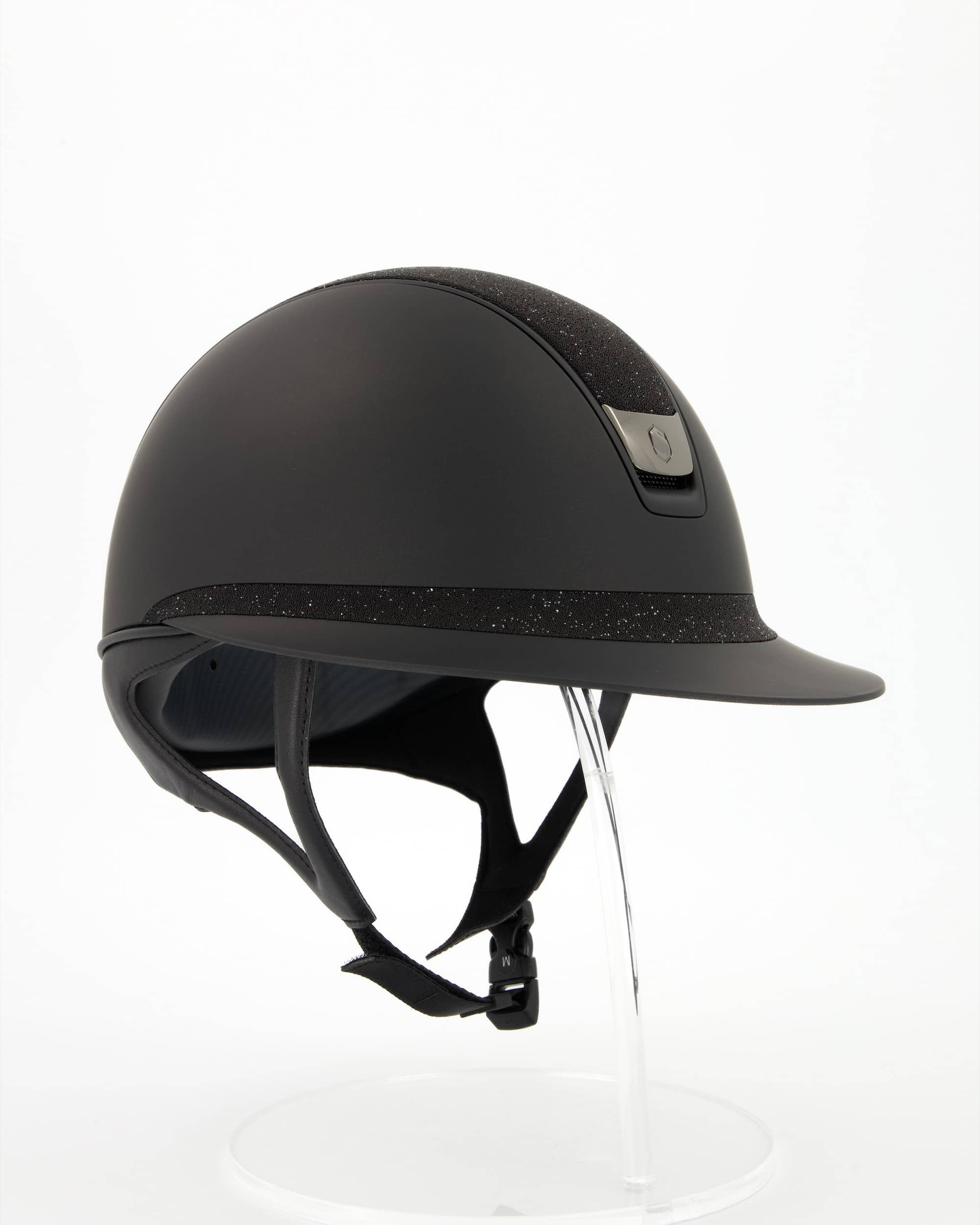 Riding helmet 2.0 Miss Shield Shadowmatt, Top Crystal Fabric Swarovski Black, Frontal Band Crystal Fabric Swarovski Black, Trim Matt Black, Blason Chrome Black in black