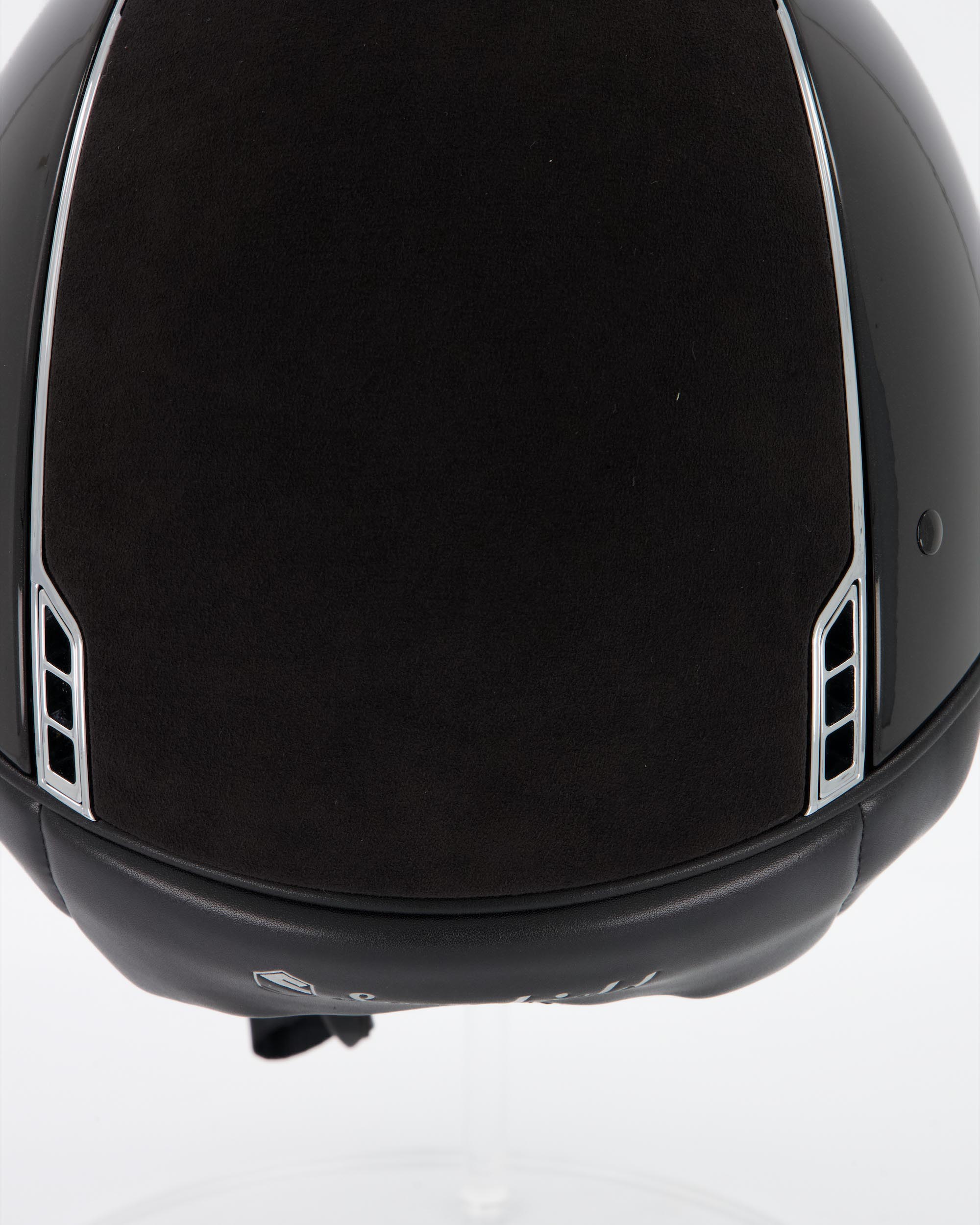 Riding helmet Miss Shield Shadowglossy Black, Top Alcantara Black, Frontalband Alcantara Black, Trim Chrome Silver, Blason Chrome Silver in black