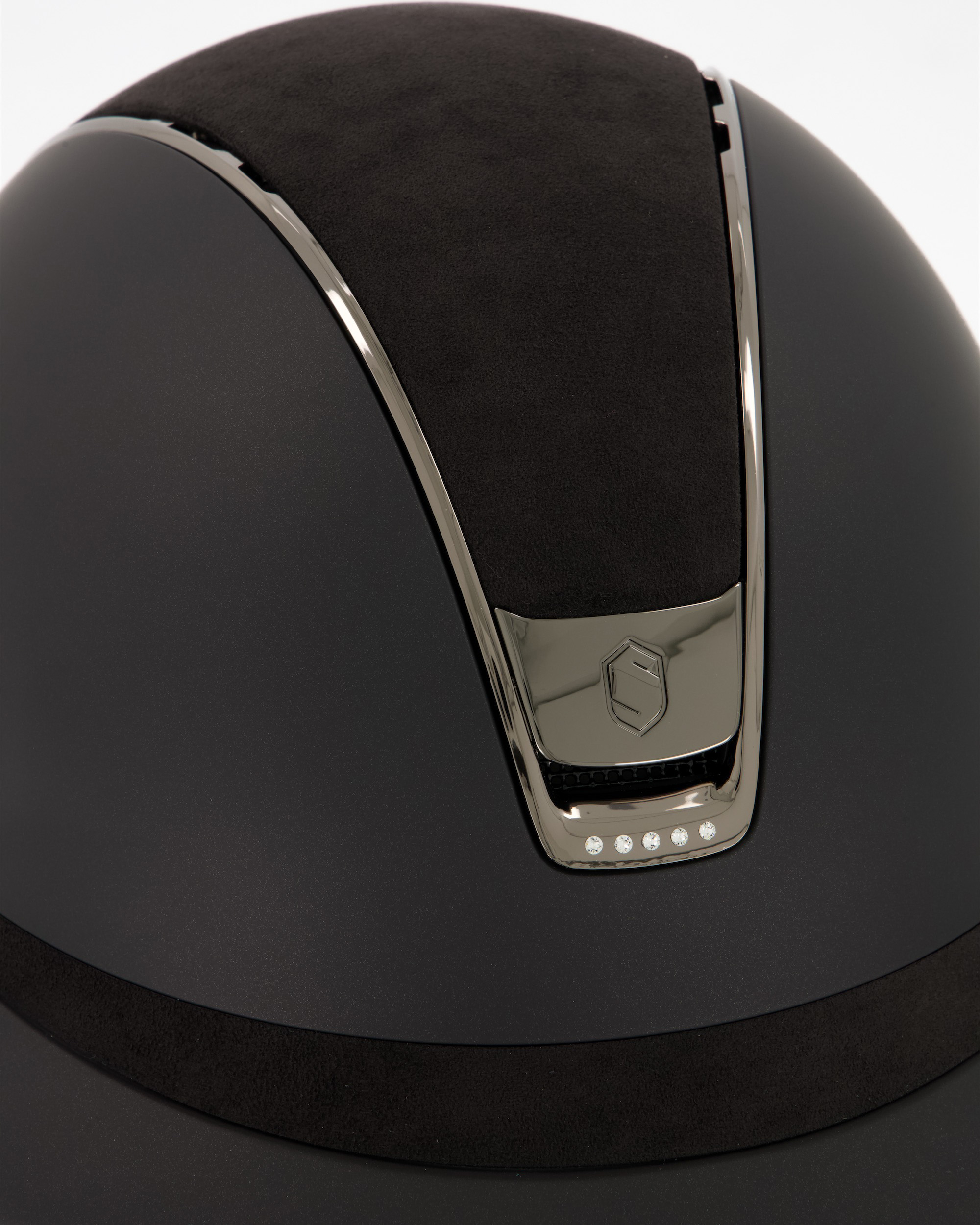 Riding helmet Miss Shield 2.0 Shadowmatt , Top and frontal band Alcantara black, Trim and Blason Chrome Black, 5 Swarovski in black