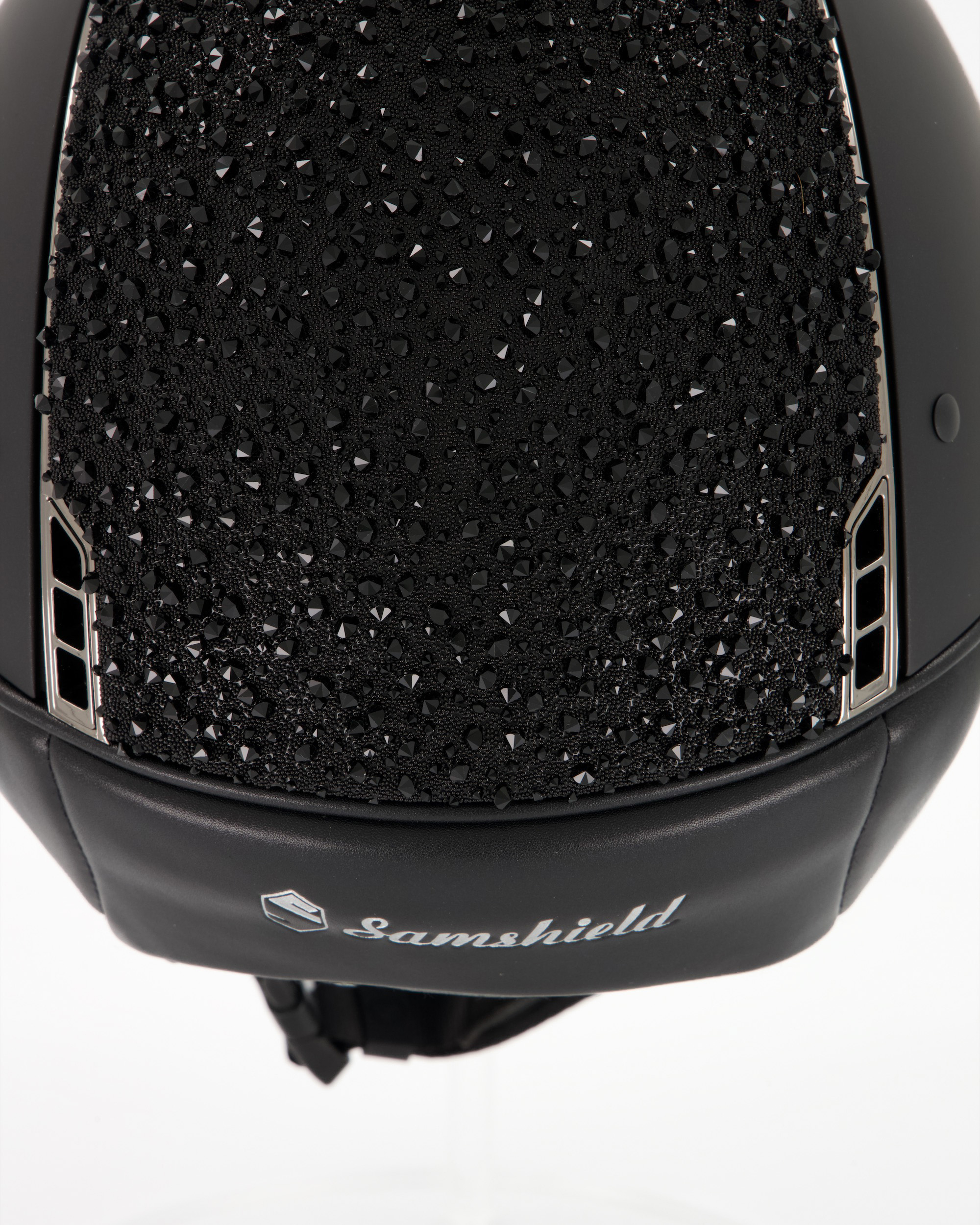 Reithelm Shadowmatt black, Top Crystal Medley Swarovski black, Trim u. Blason Chrome black 5Swarovski in schwarz