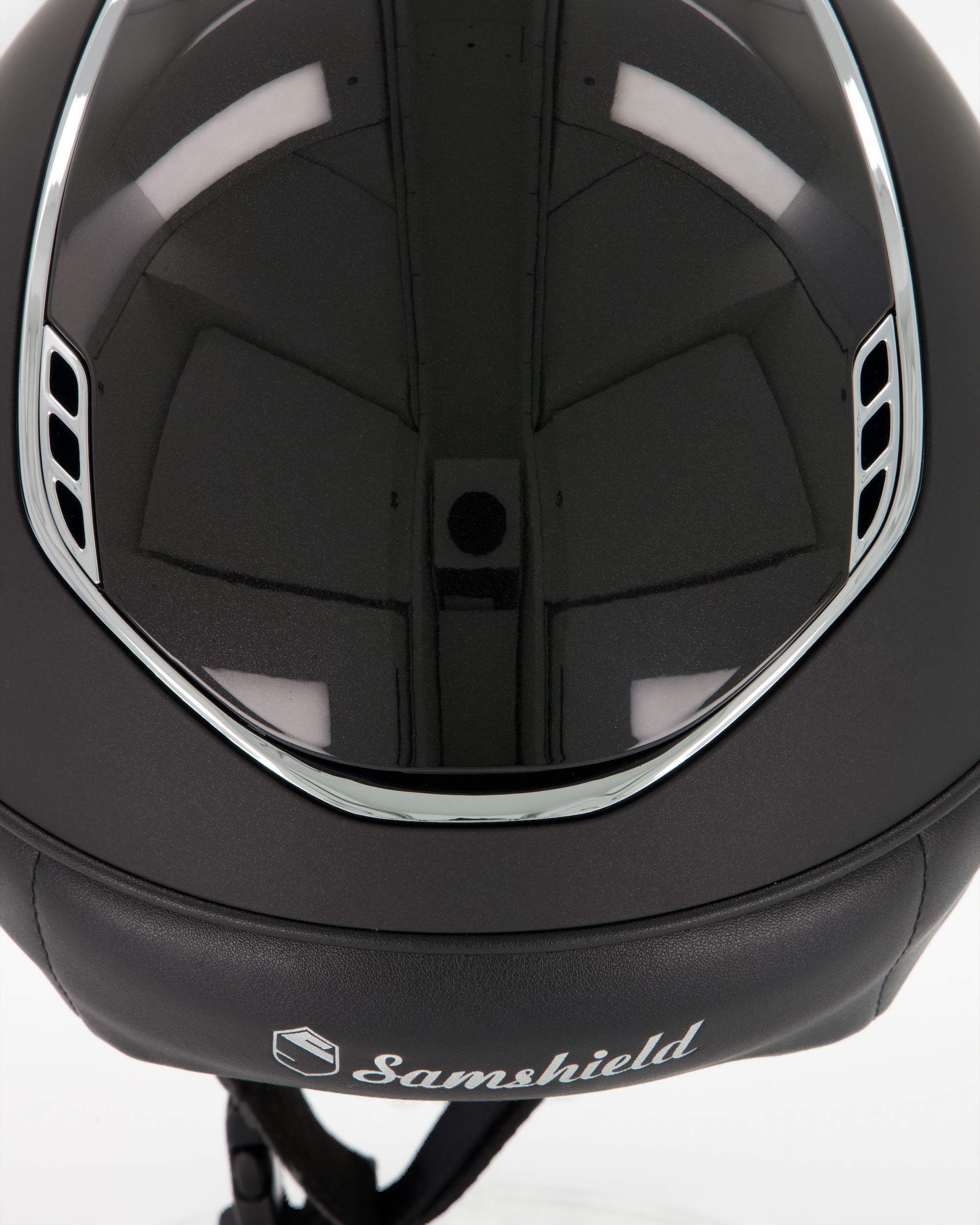 Reithelm 2.0 Miss Shield Shadowmatt, Top Shadow Glossy Black, Frontal Band Flower Swarovski Black, Trim Chrome Silver, Blason Crystal Fabric Silver in schwarz