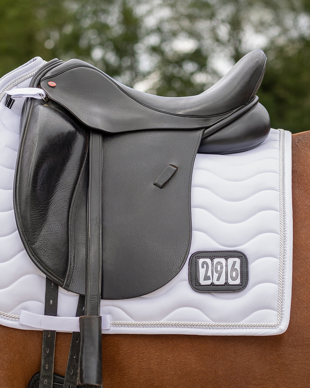 Saddle pad with start numbers