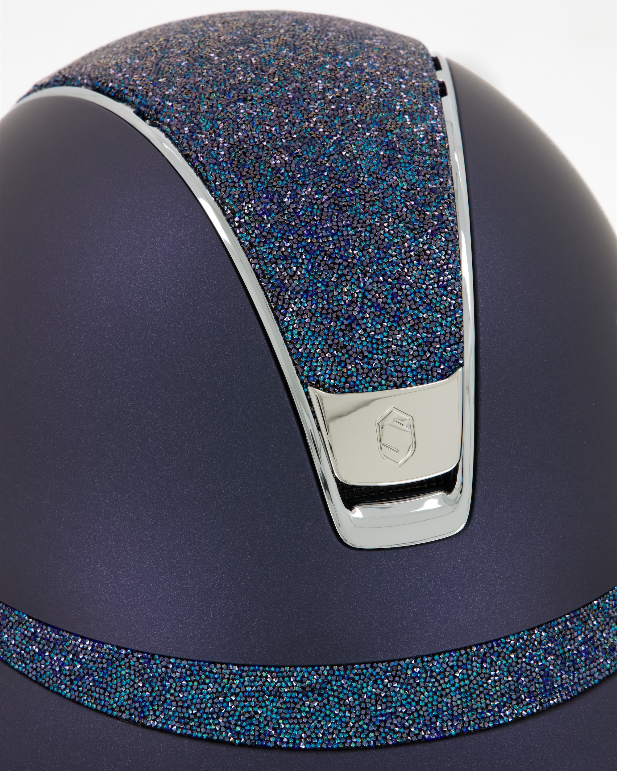 Riding helmet 2.0 Miss Shield Shadowmatt Blue, top and front strap Ultra Fine Rocks, Trim and Blason Chrome Silver in blue