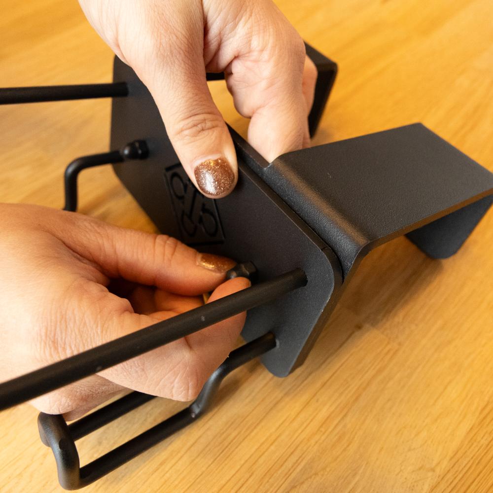 Extra hooks for helmet holder