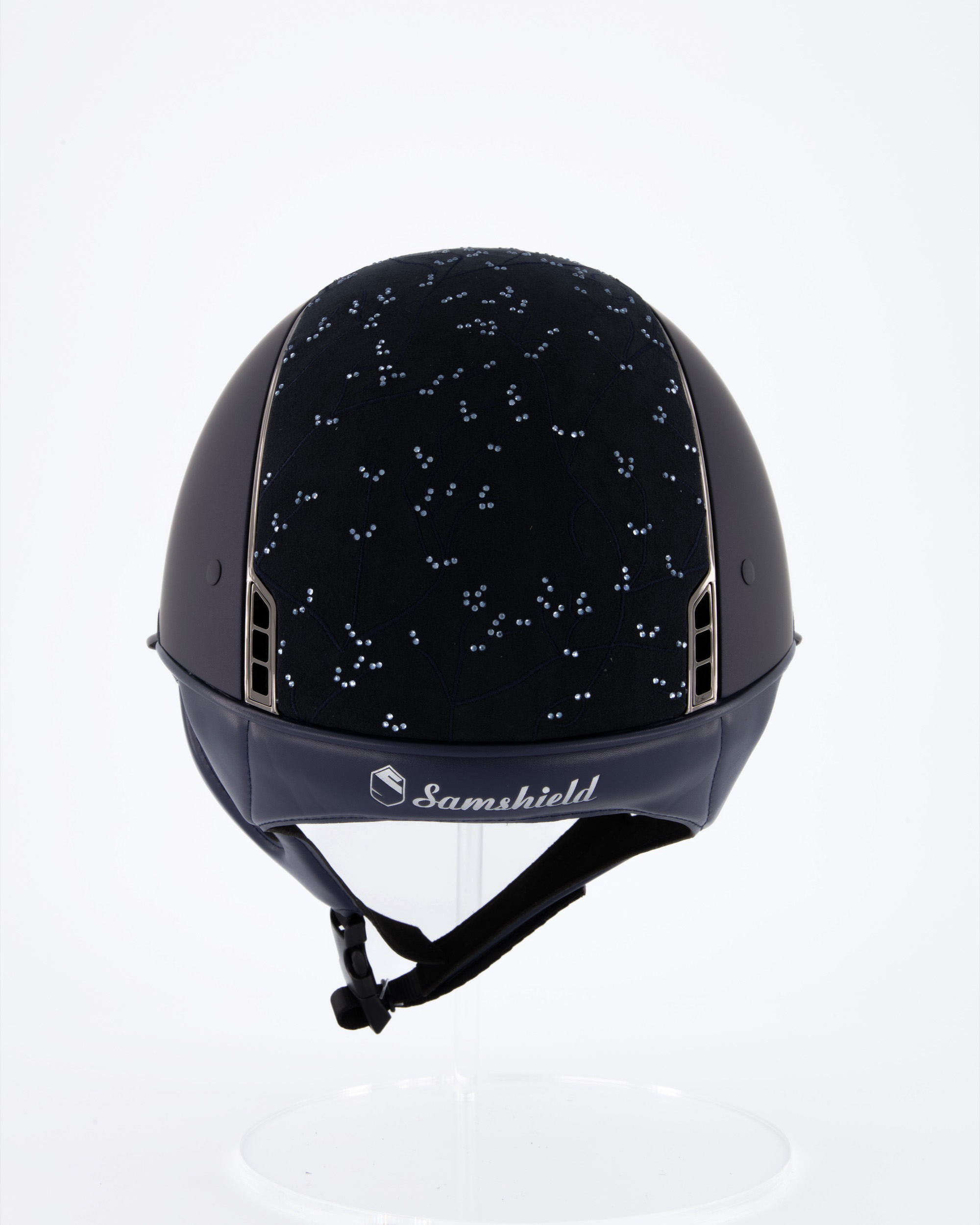 Riding helmet Miss Shield Shadowmatt Blue, Top Crystal Leaf Blue / Alcantara Blue, Frontal Band Alcantara Blue, Trim Chrome Black, Blason Chrome Black in blue