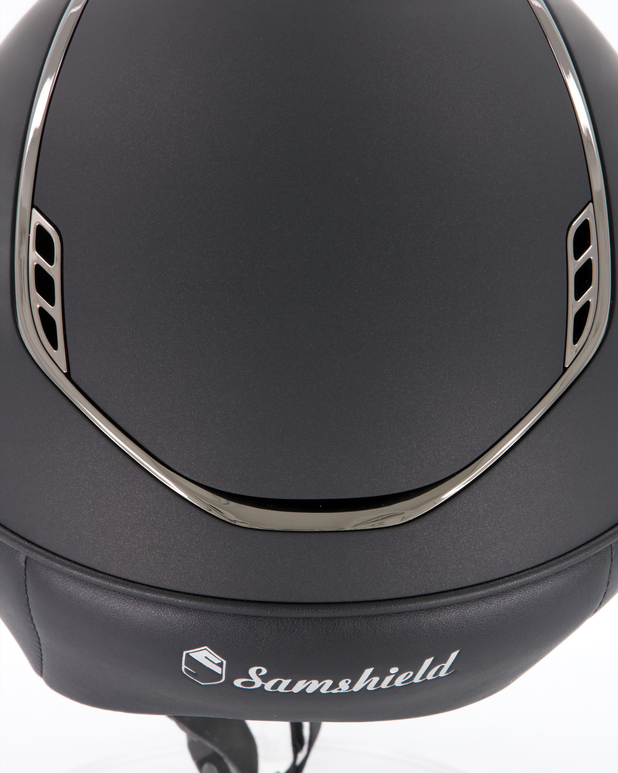 Reithelm 2.0 Shadowmatt black, Frontalband Crystal Comet light, Trim u. Blason Chrome Black