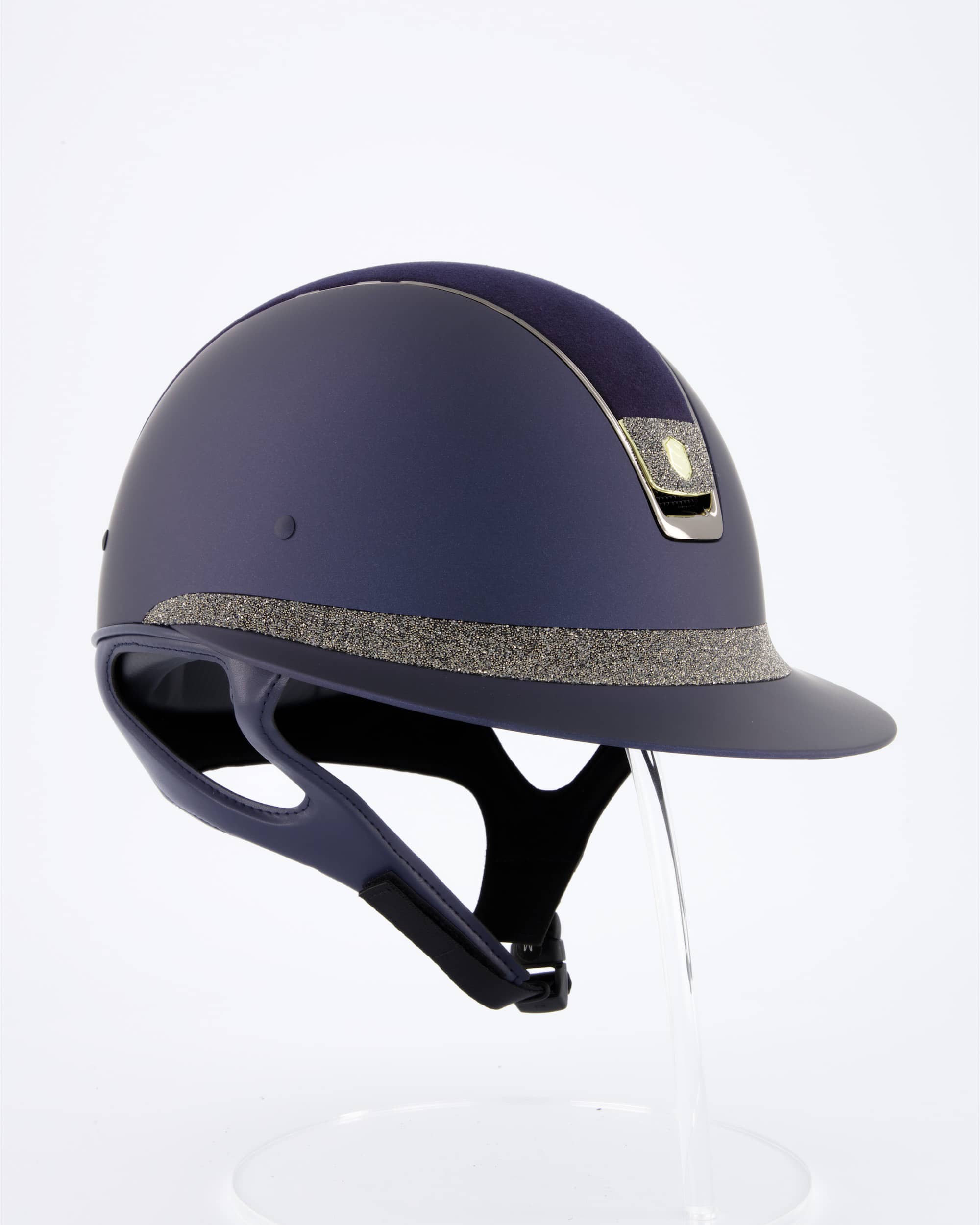 Riding helmet Miss Shield Shadowmatt Blue, Top Alcantara Blue, Frontal Band Crystal Fabric Swarovski Metal Eclipse, Trim Chrome Black, Blason Crystal Fabric Gold