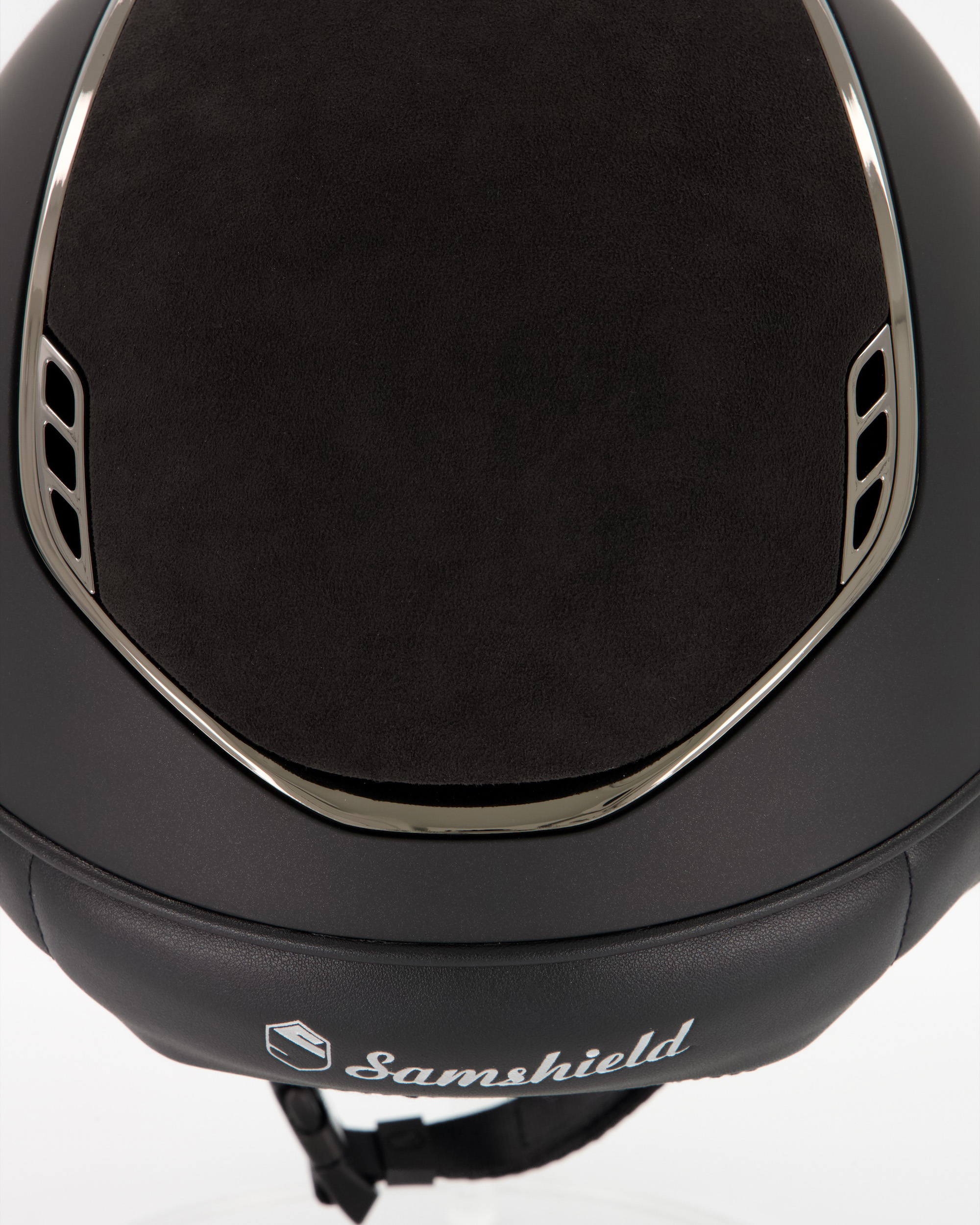 Riding helmet Miss Shield 2.0 Shadowmatt , Top and frontal band Alcantara black, Trim and Blason Chrome Black, 5 Swarovski in black