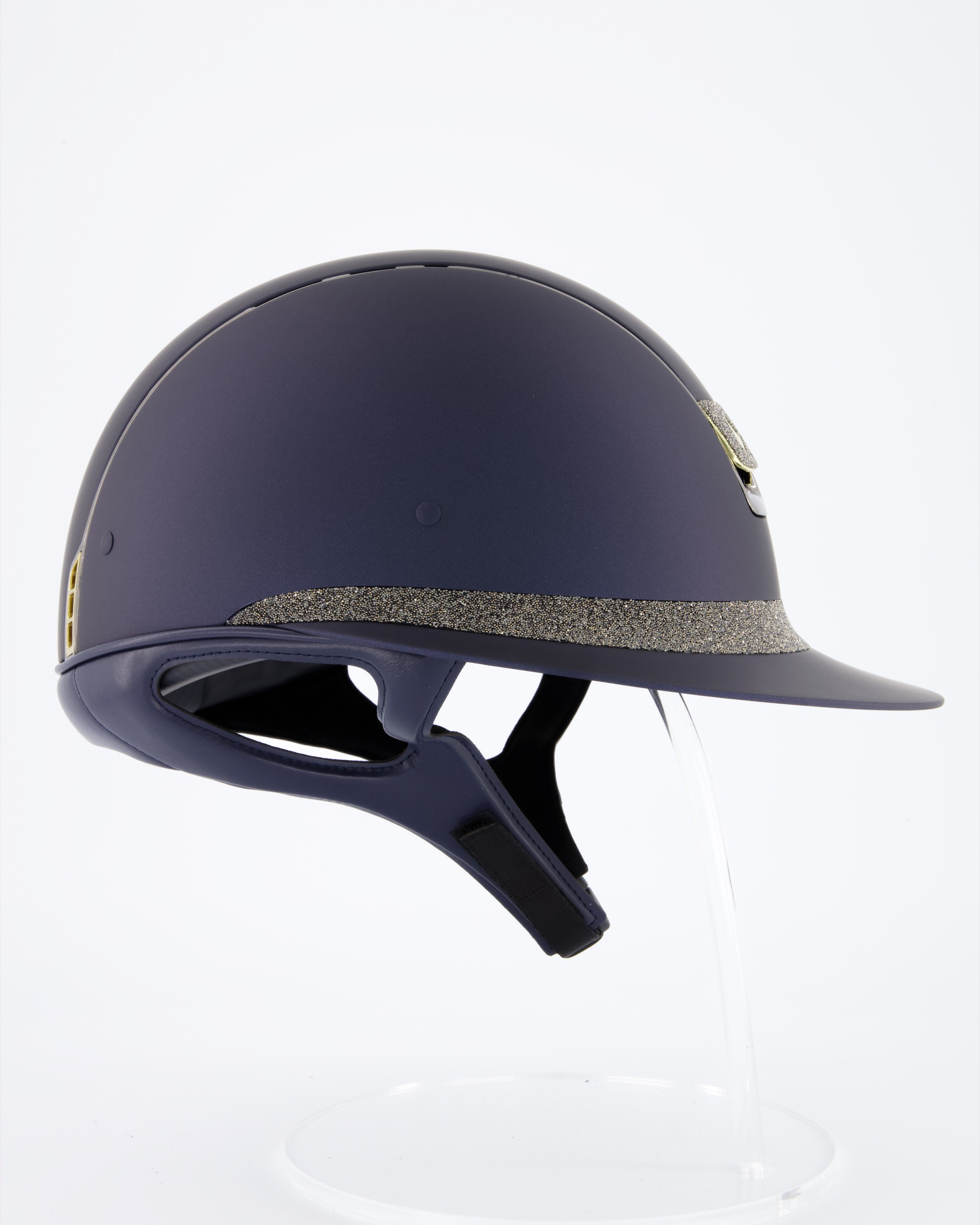 Riding helmet Miss Shield Shadowmatt Blue, Top Shadowmatt blue, Frontal Band Crystal fabric Swarovski Metal Eclipse, Trim Chrome Black, Blason Crystal Fabric Gold