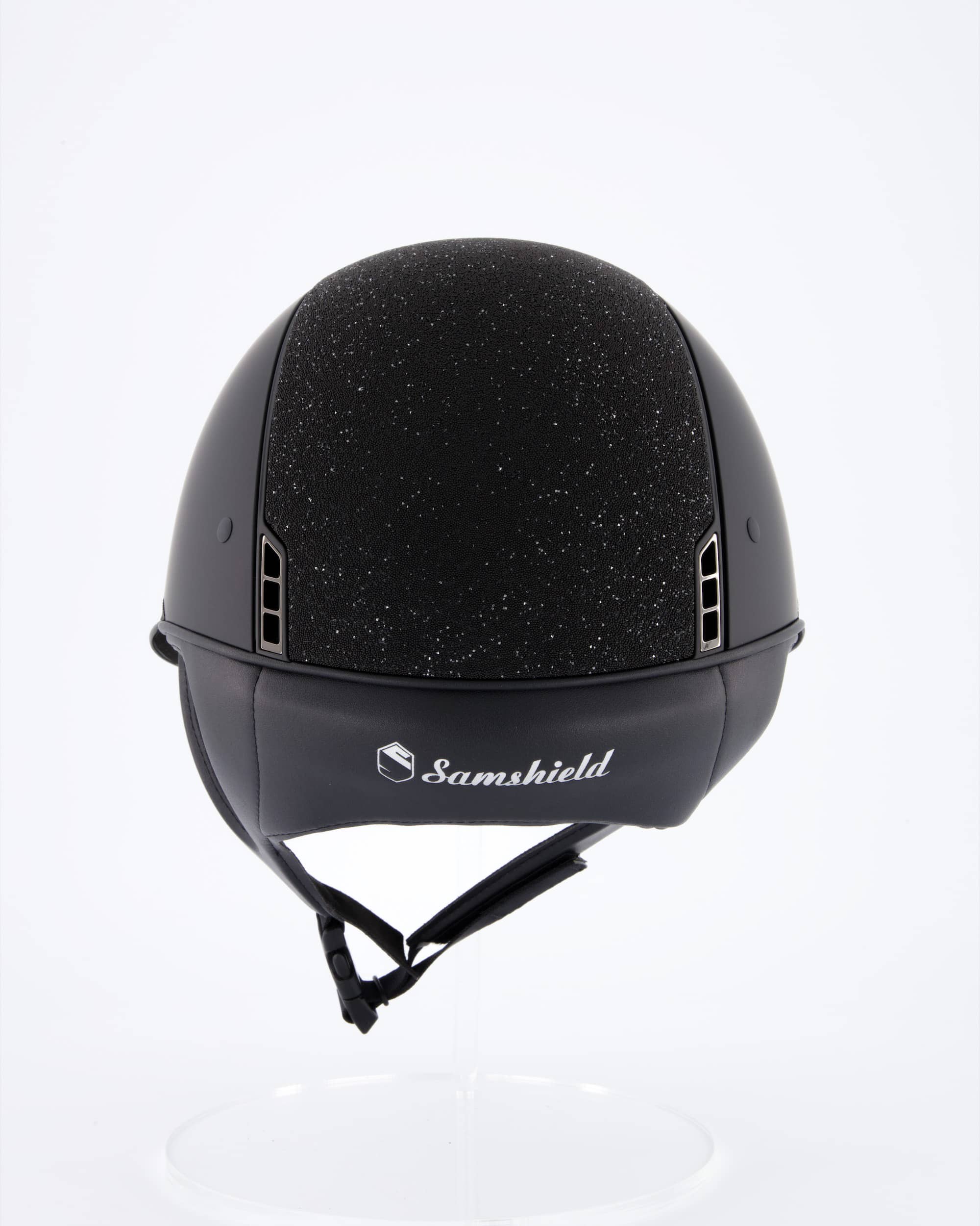 Riding helmet Miss Shield Shadowmatt, Top Crystal Fabric Swarovski Black, Frontal Band Crystal Fabric Swarovski Black, Trim Matt Black, Blason Chrome Black in black