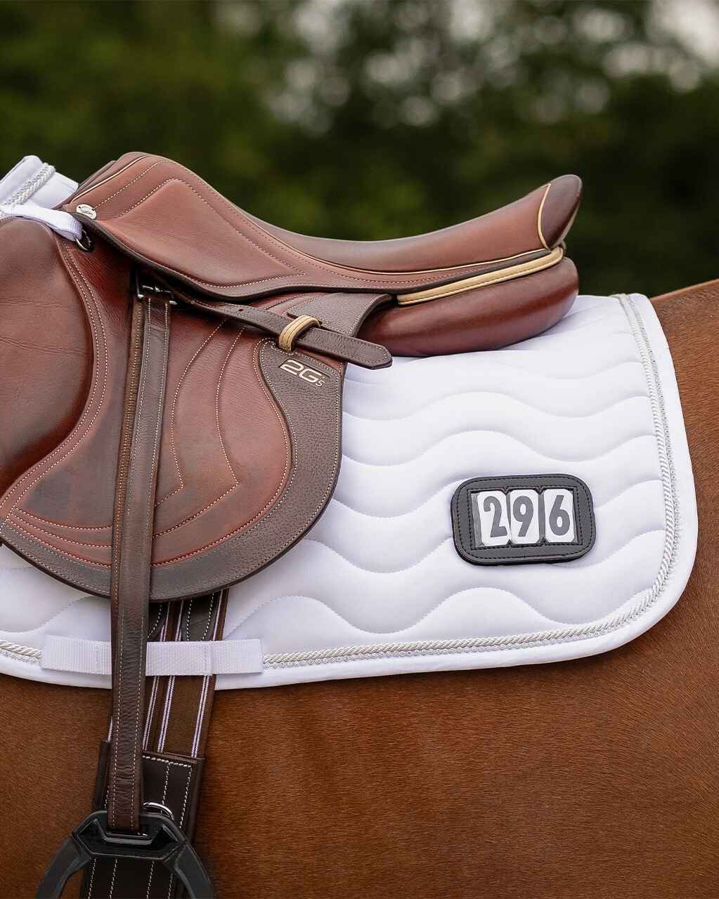 Saddle pad with start numbers
