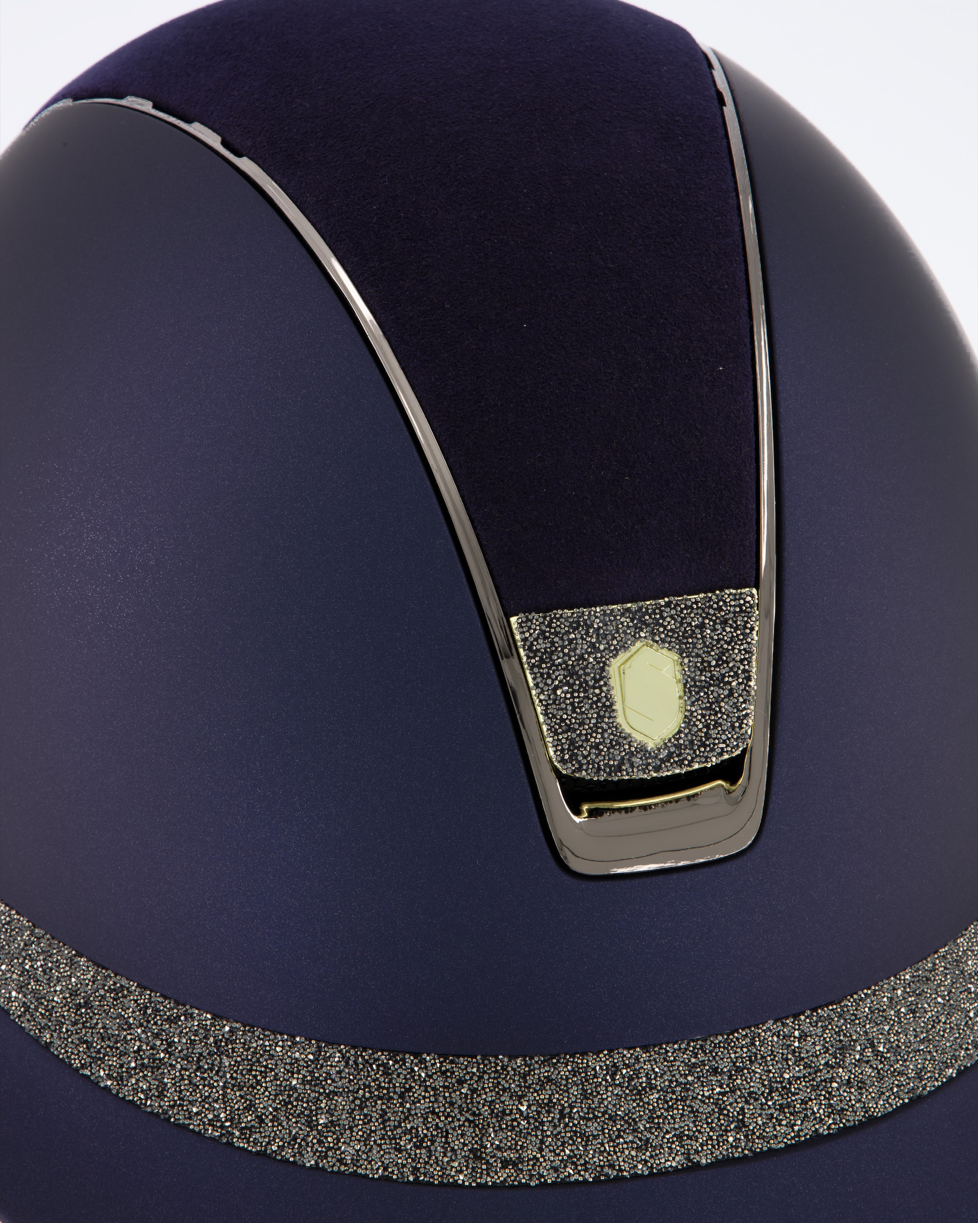 Riding helmet Miss Shield Shadowmatt Blue, Top Alcantara Blue, Frontal Band Crystal Fabric Swarovski Metal Eclipse, Trim Chrome Black, Blason Crystal Fabric Gold