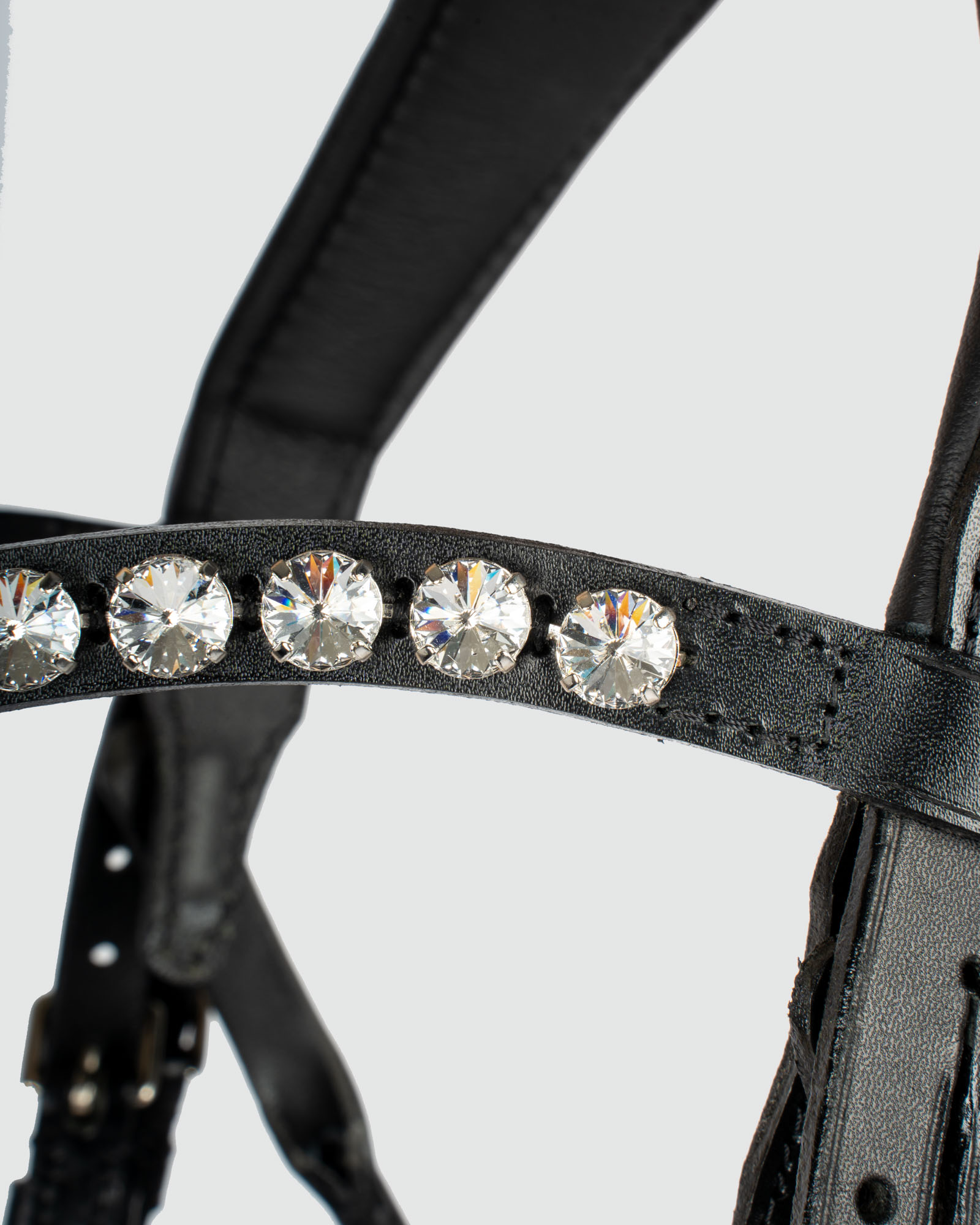 Bellevue snaffle bridle round-stitched with bridle hooks, Swedish Comfort XS patent noseband, Rivoli Crystal browband incl. 16mm round-stitched web reins in black
