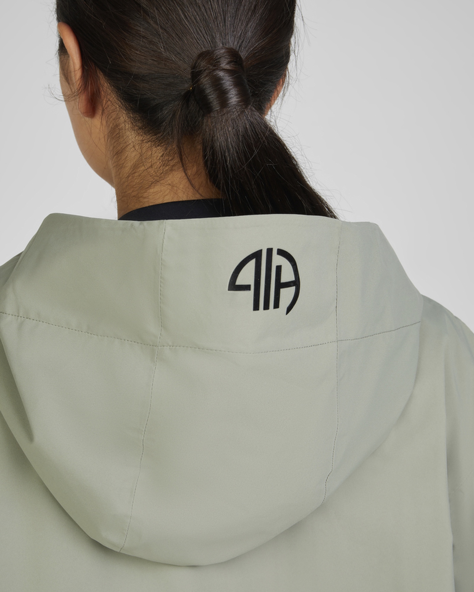 Women's Athleisure rain poncho in light moss