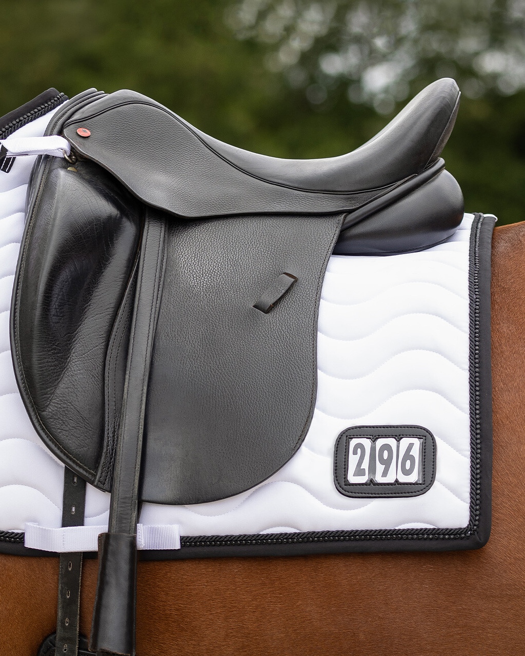 Saddle pad with start numbers