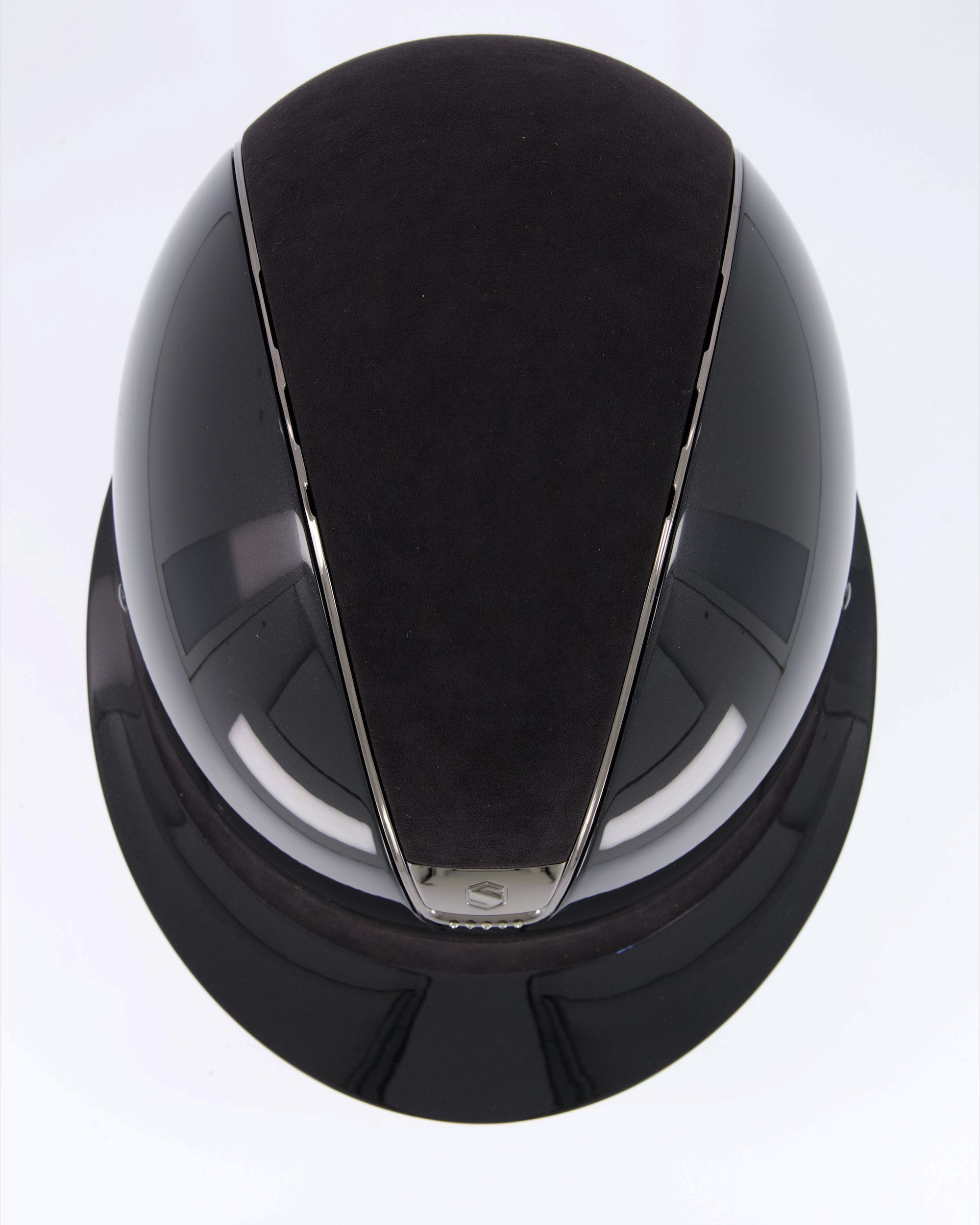 Riding helmet Miss Shield Shadowglossy Black, Top and frontal band Alcantara Black, Trim Matt Black, Blason Chrome Black, 5 Swarovski stones Black