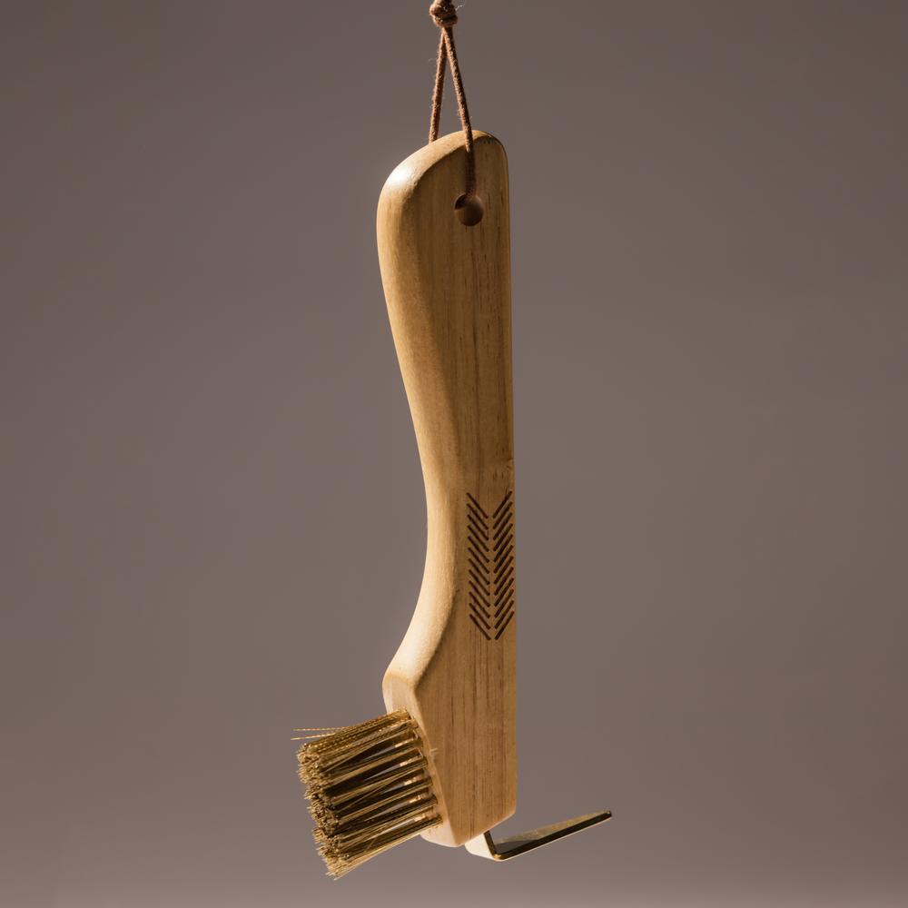 Hoof pick with metal brush