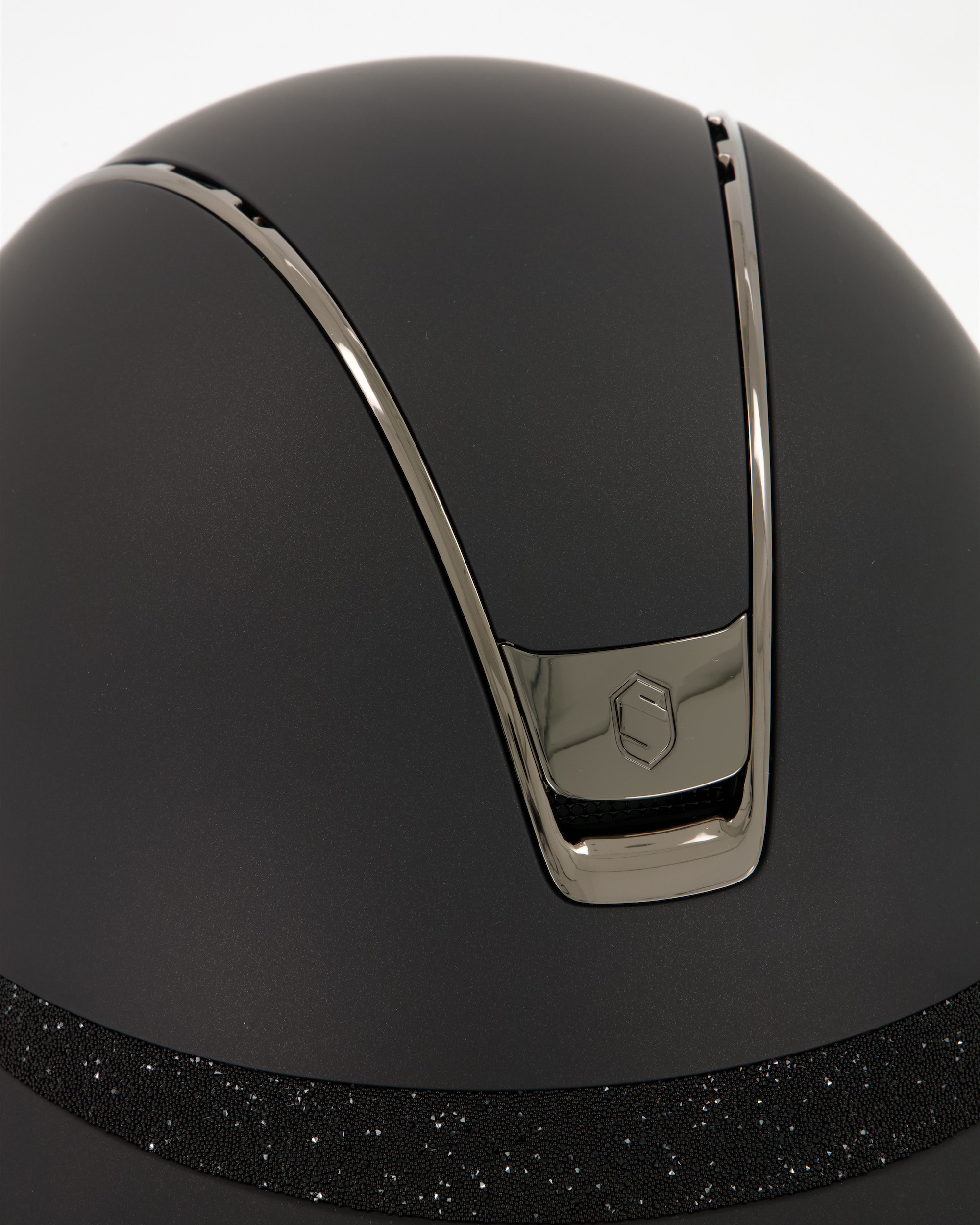 Riding helmet 2.0 Miss Shield Shadowmatt,Frontal Band Crystal Fabric Black, Trim u. Blason Chrome Black in black