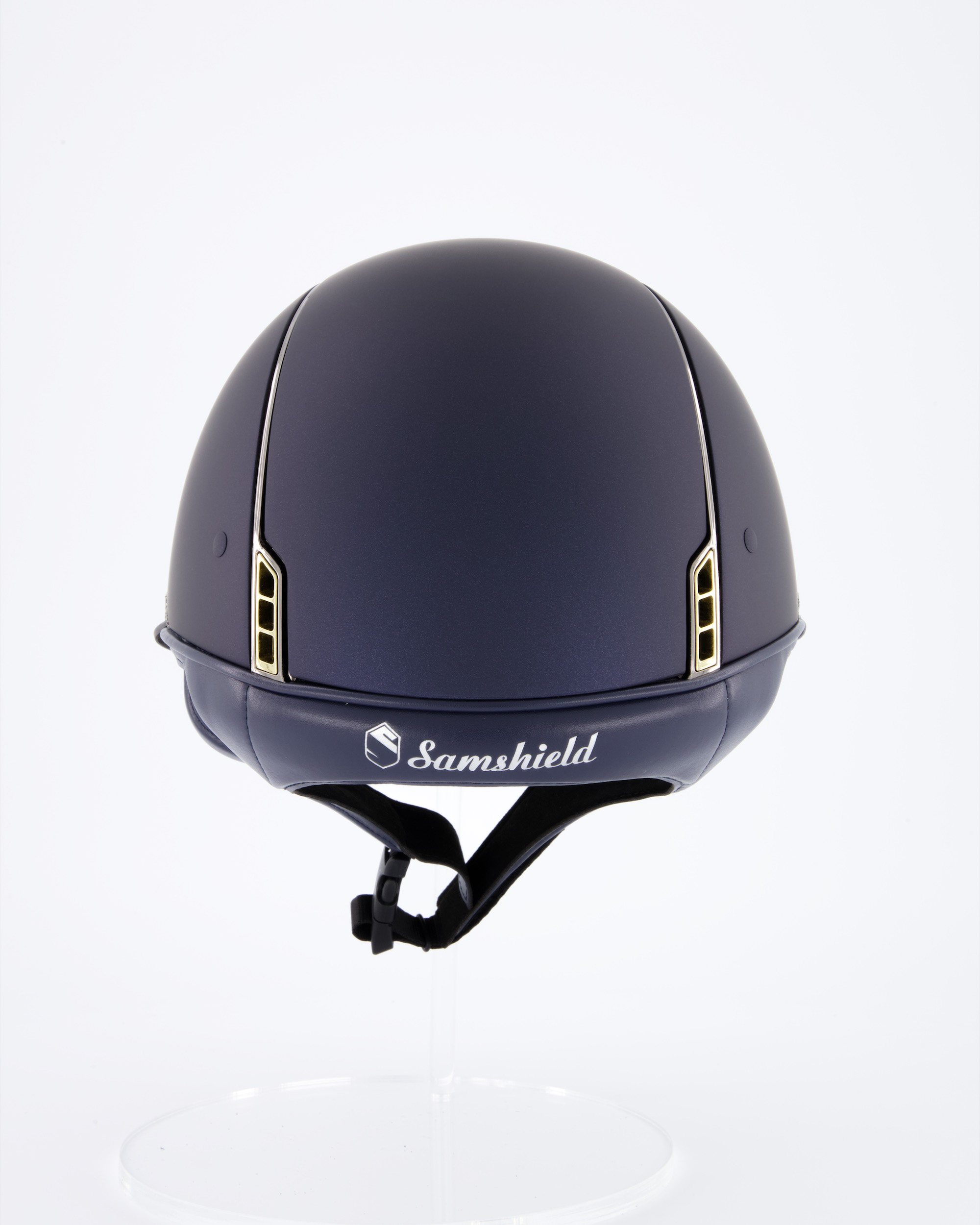 Riding helmet Miss Shield Shadowmatt Blue, Top Shadowmatt blue, Frontal Band Crystal fabric Swarovski Metal Eclipse, Trim Chrome Black, Blason Crystal Fabric Gold
