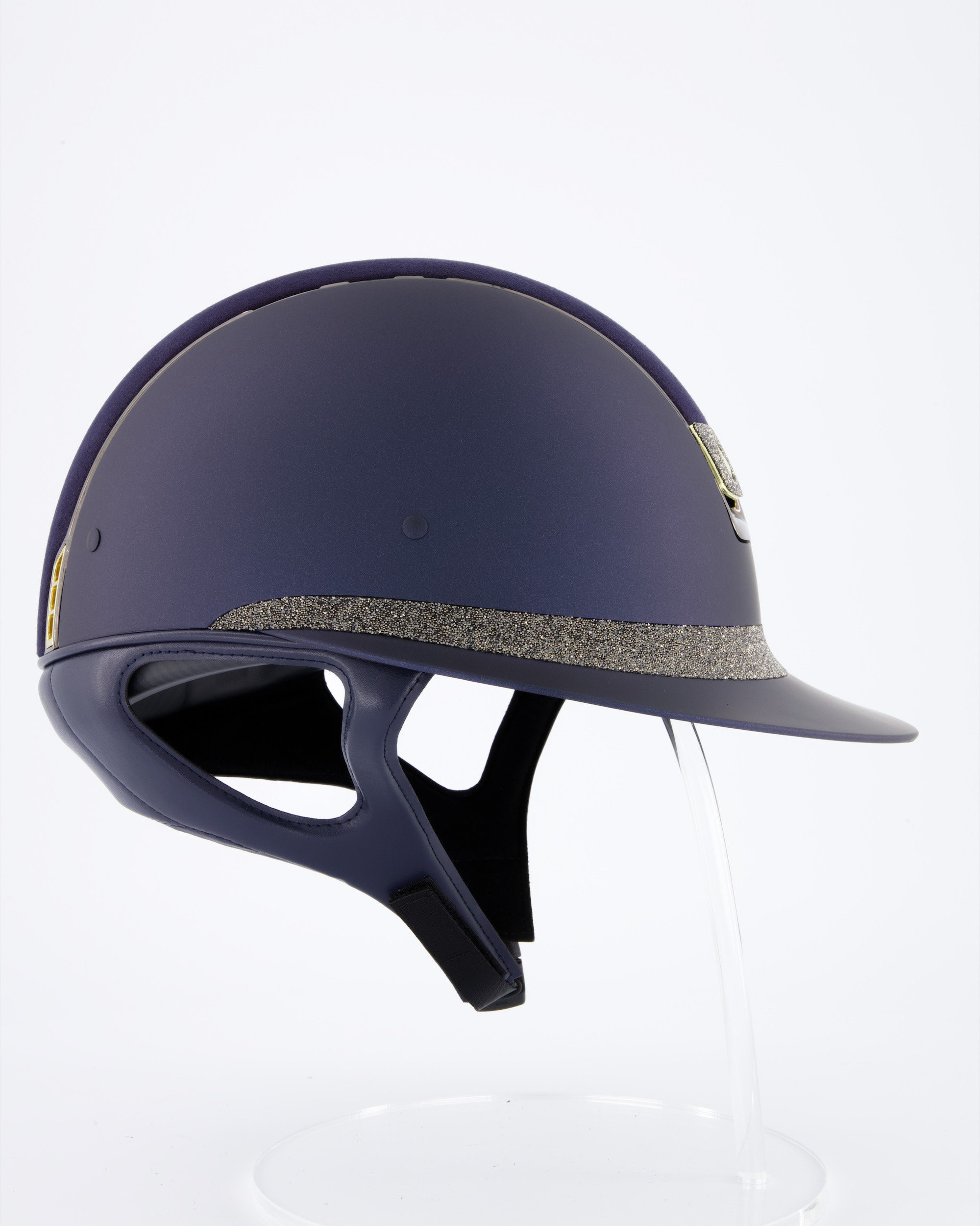 Riding helmet Miss Shield Shadowmatt Blue, Top Alcantara Blue, Frontal Band Crystal Fabric Swarovski Metal Eclipse, Trim Chrome Black, Blason Crystal Fabric Gold