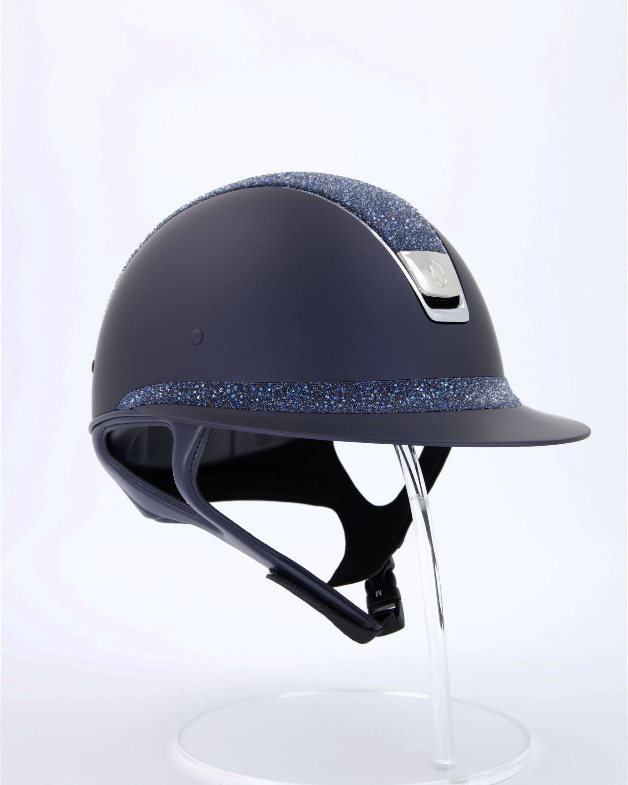 Riding helmet Miss Shield Shadowmatt, Top Crystal Fine Medley Swarovski Moonlight, Frontal Band Crystal Fine Medley Swarovski Moonlight, Trim Chrome Silver, Blason Chrome Silver in blue