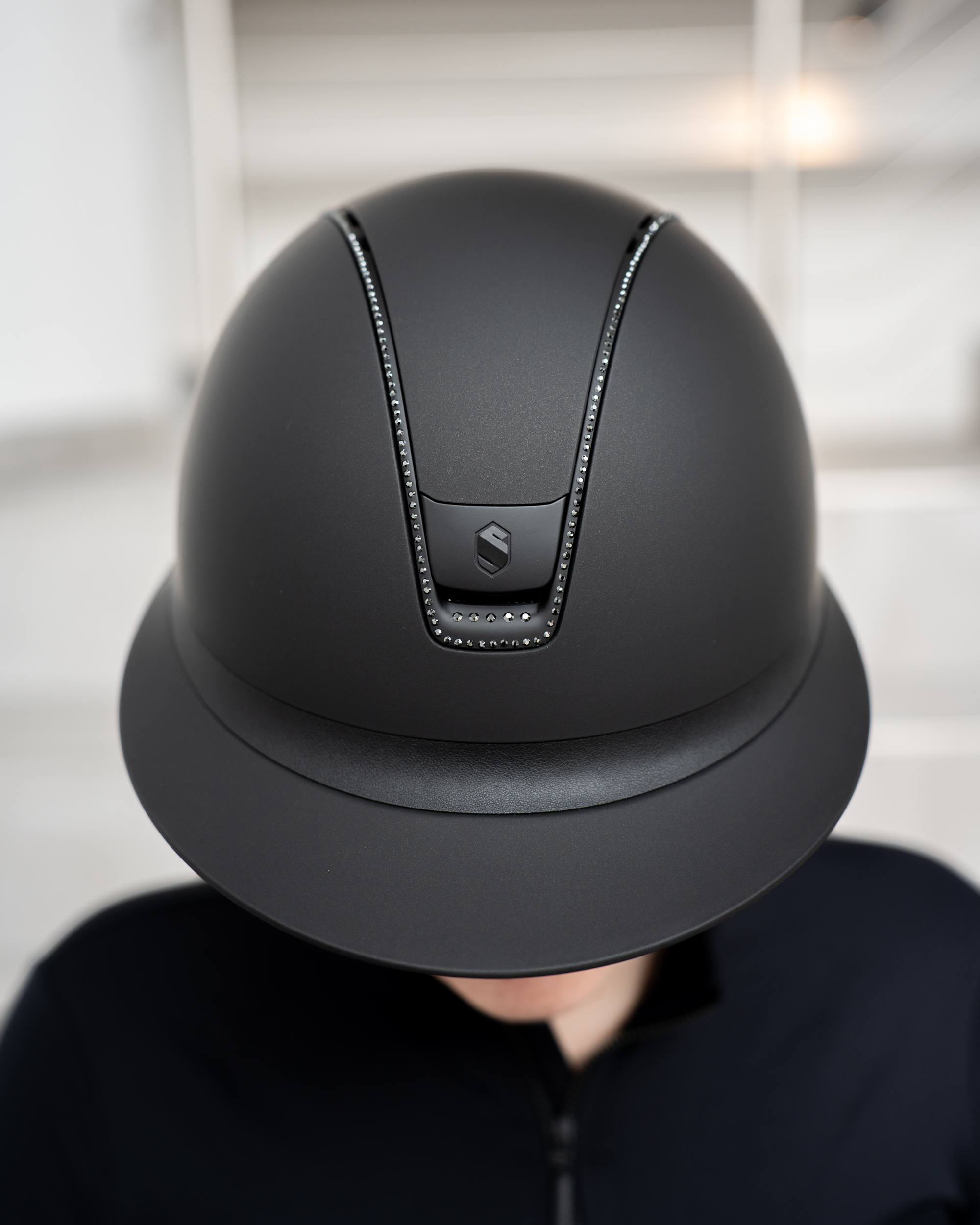 Riding helmet 2.0 Miss Shield Shadowmatt Black, Trim u. Blason Matt Black 300 Swarovski Jet Hemitate in black