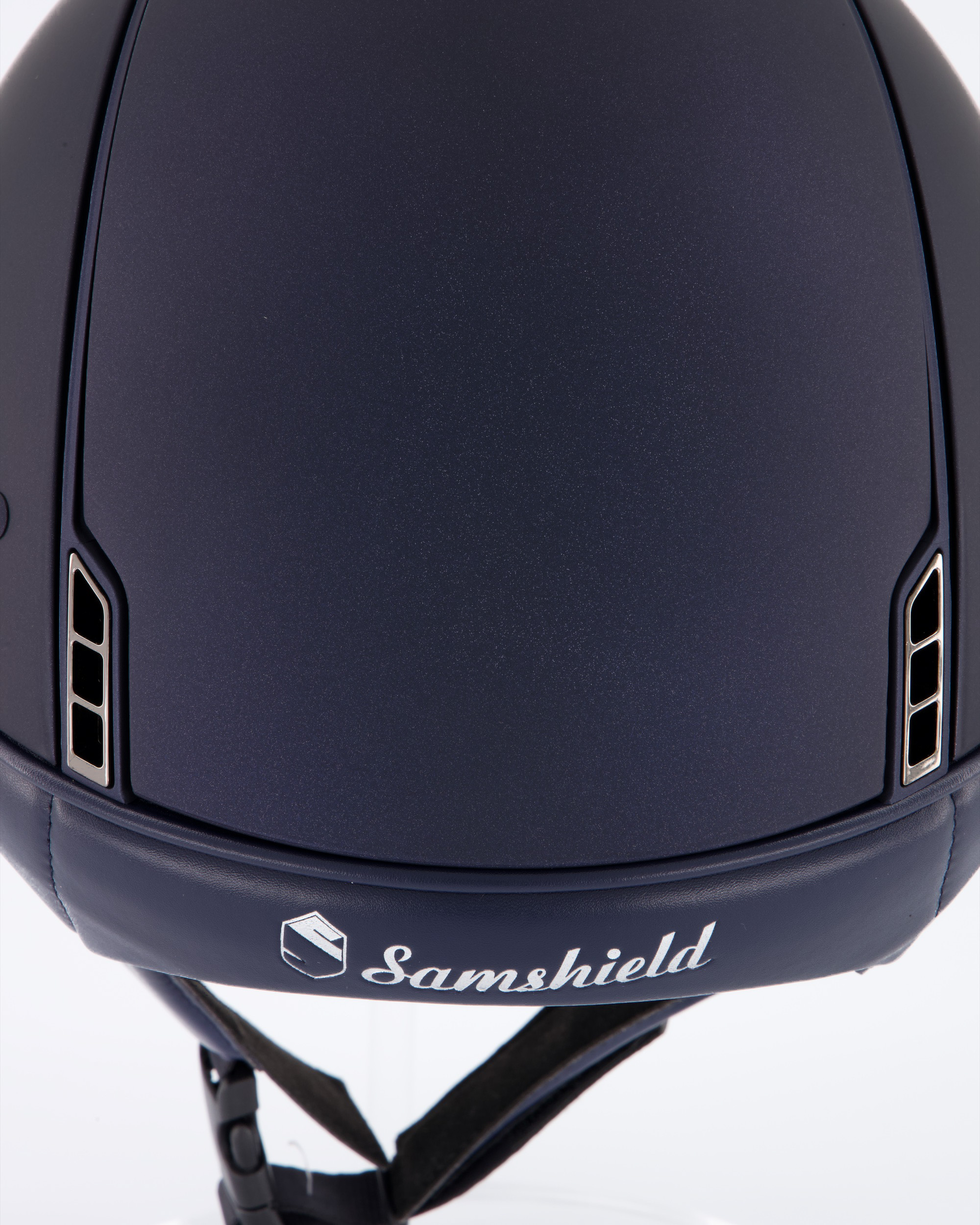 Riding helmet Miss Shield Shadowmatt Blue, Top Shadowmatt Blue, Frontal Band Flower Embroidery Blue, Trim Matt Navy Blue, 5 Swarovski Dark Blue, Blason Chrome Black